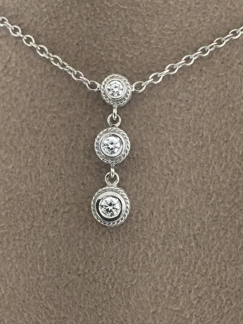 Penny Preville Ladies Diamond Necklace 
18k White Gold 
3 Bezel Set Diamond 0.18 carat total weight 
Chain 16