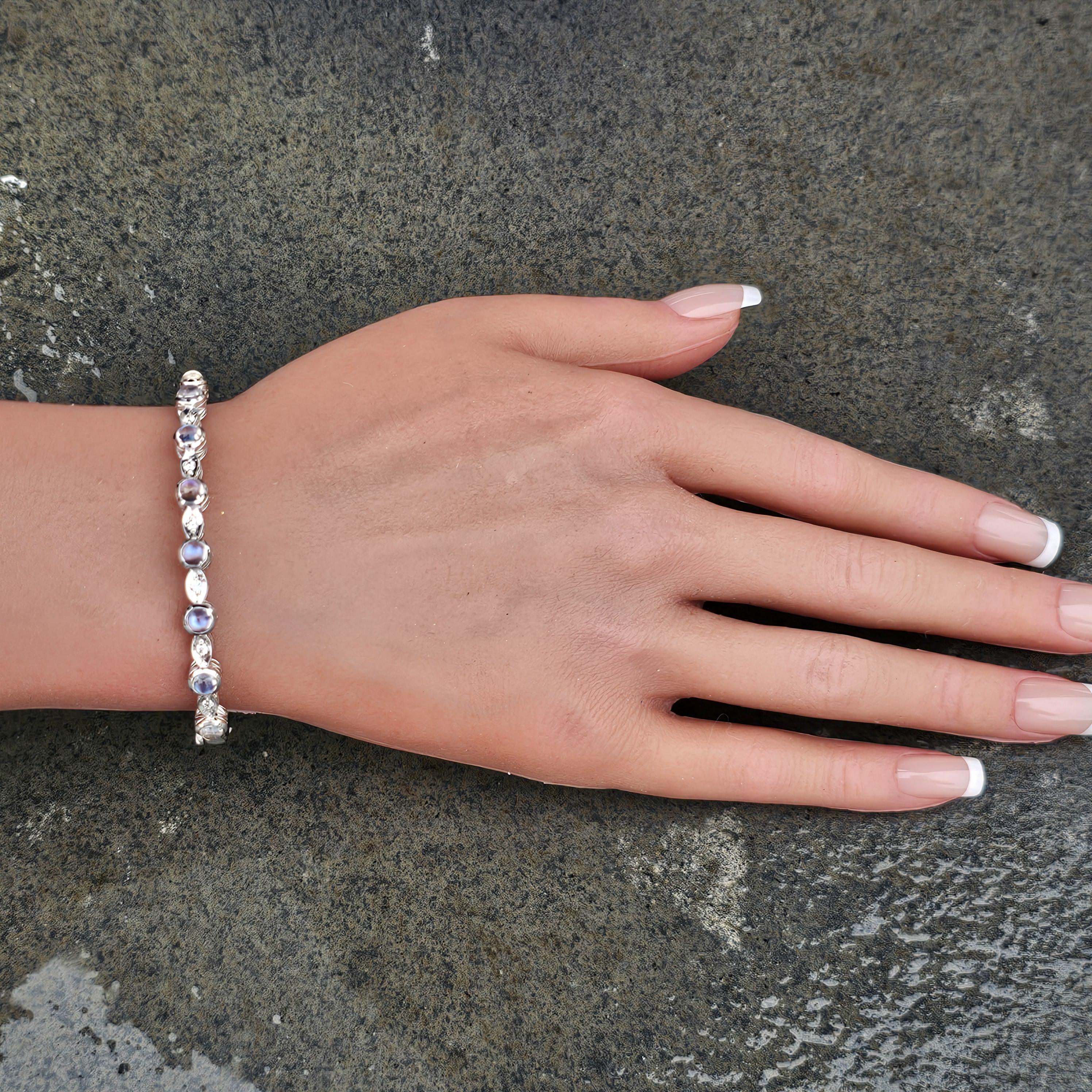 Penny Preville Moonstone Diamond Bangle Bracelet 18k White Gold

Presenting an exquisite Penny Preville creation, a bangle bracelet that captivates with its elegance and craftsmanship.

This piece is crafted from solid 18k white gold, featuring