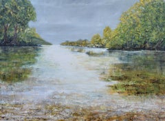 Une rivière traverse.  Paysage anglais contemporain