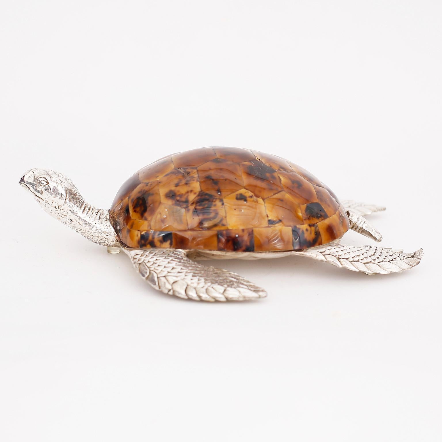 Mid century object of art of a sea turtle crafted in silver plate over bronze with a penshell shell. Signed Maitland Smith on the bottom.