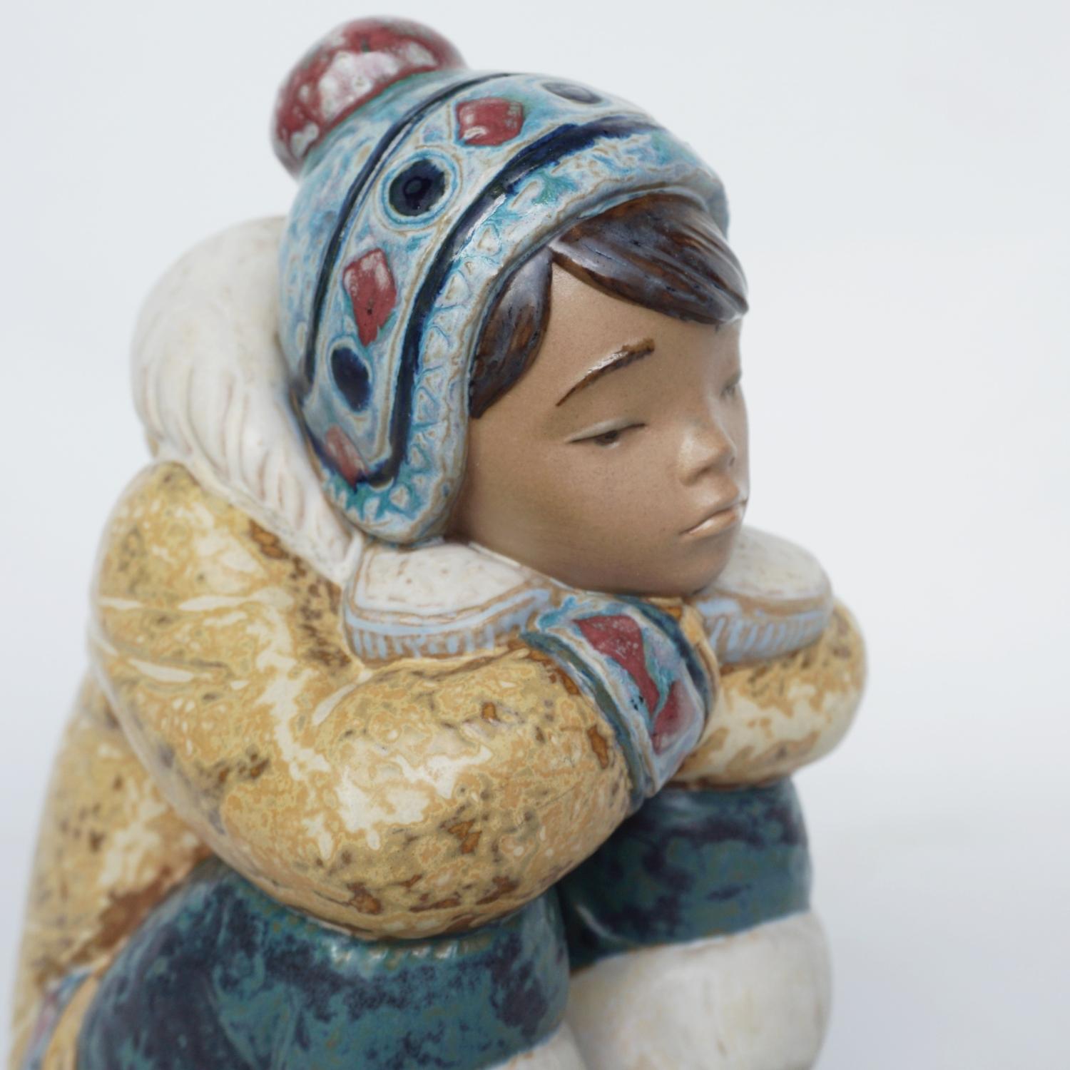 'Pensive Inuit Boy' Pottery Figurine by Lladro 1