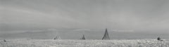 Sayan, Tuva Siberia (Teepee fire lays in open field, winter sky)