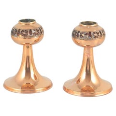 Pentti Sarpaneva. Pair of brass candlesticks with decorative enamel band.