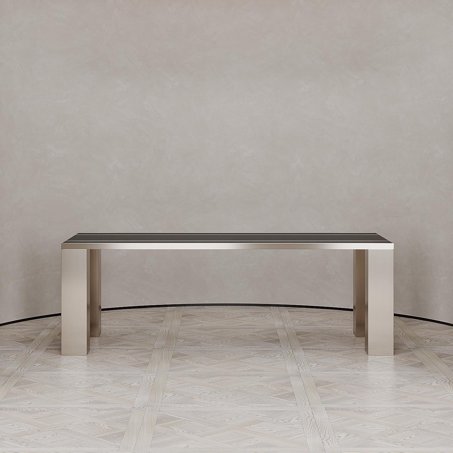 The Penumbra dining table is designed by Emél & Browne in the Minimalist and contemporary style and custom made in Italy by skilled artisans. The radiant copper legs of the Penumbra dining table emit a glowing sunset energy- bringing lightness to a