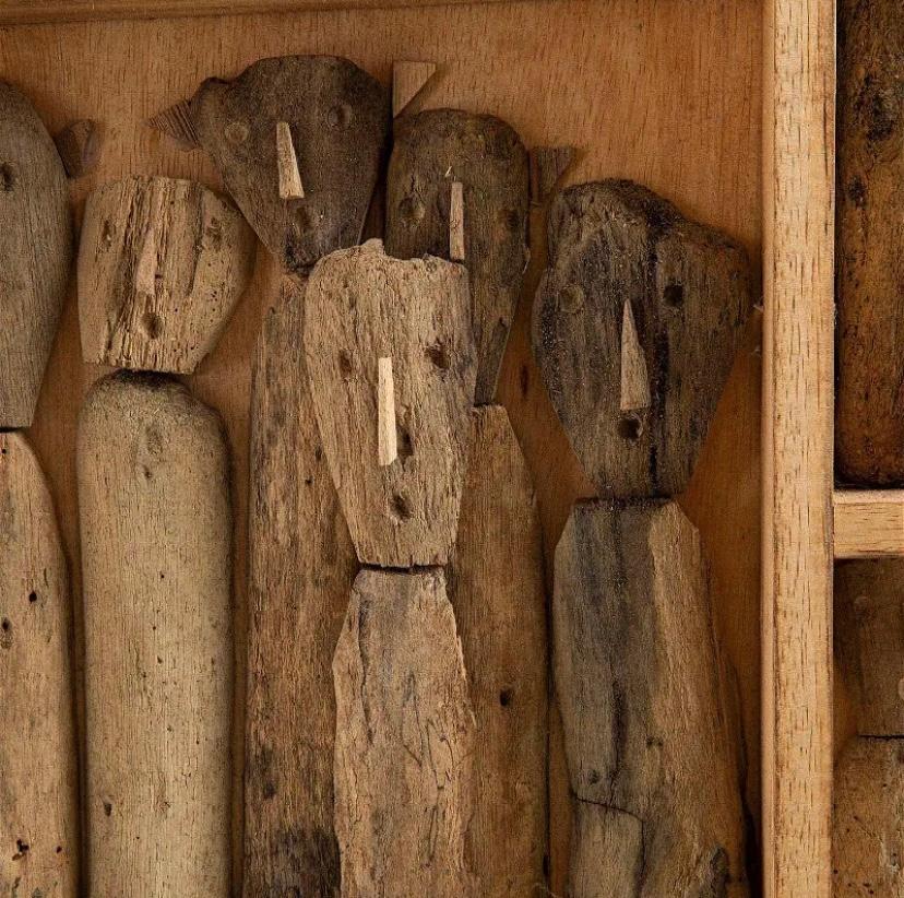 Driftwood People Wall Art Sculpture, a unique and captivating piece that brings the rustic charm of nature into your home. This handmade wall hanging features a collection of small, whimsical people figures carved from driftwood, carefully arranged
