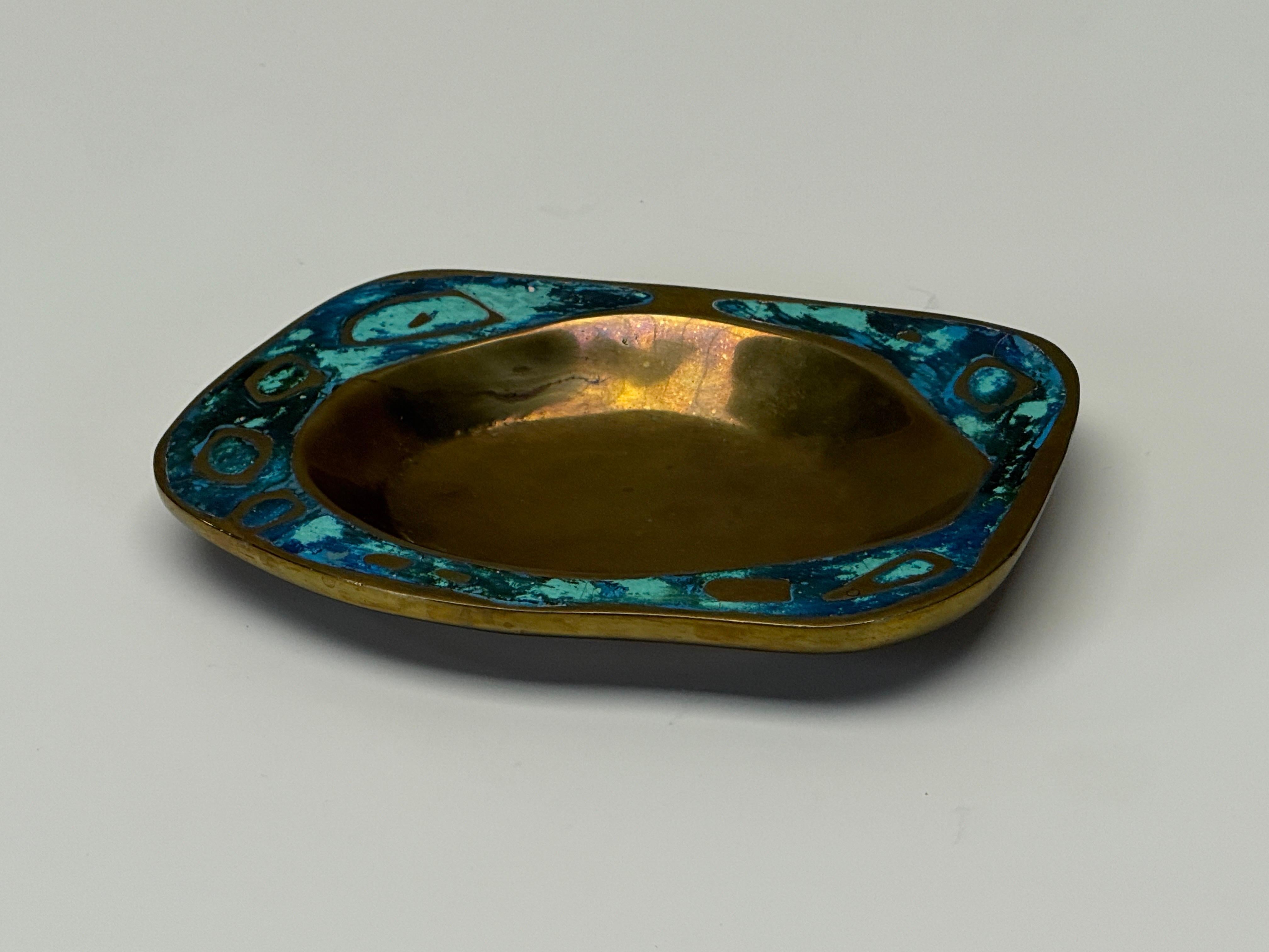 An abstract shaped tray in solid brass with faux stone inlay by Pepe Mendoza. 