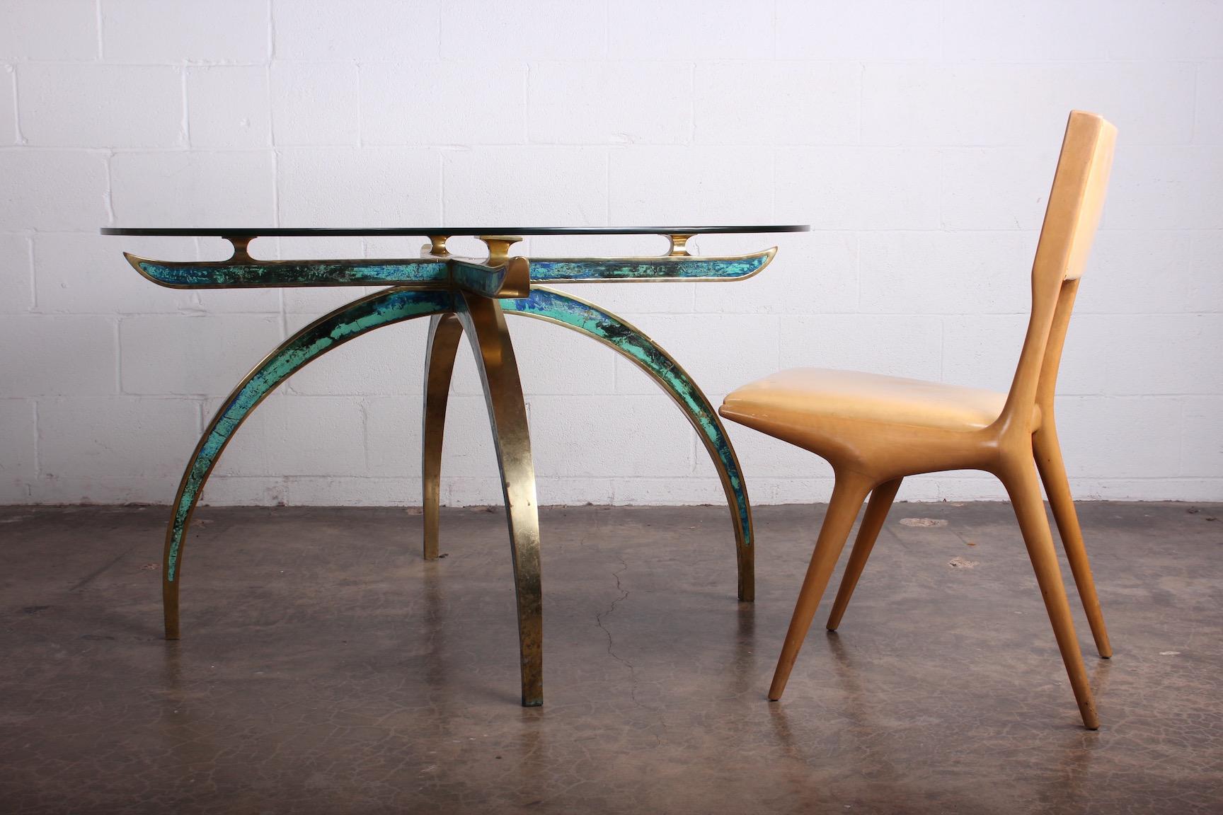 A rare and large solid brass dining table with ceramic turquoise inlay by Pepe Mendoza. Base is very heavy and could accommodate a large glass top.