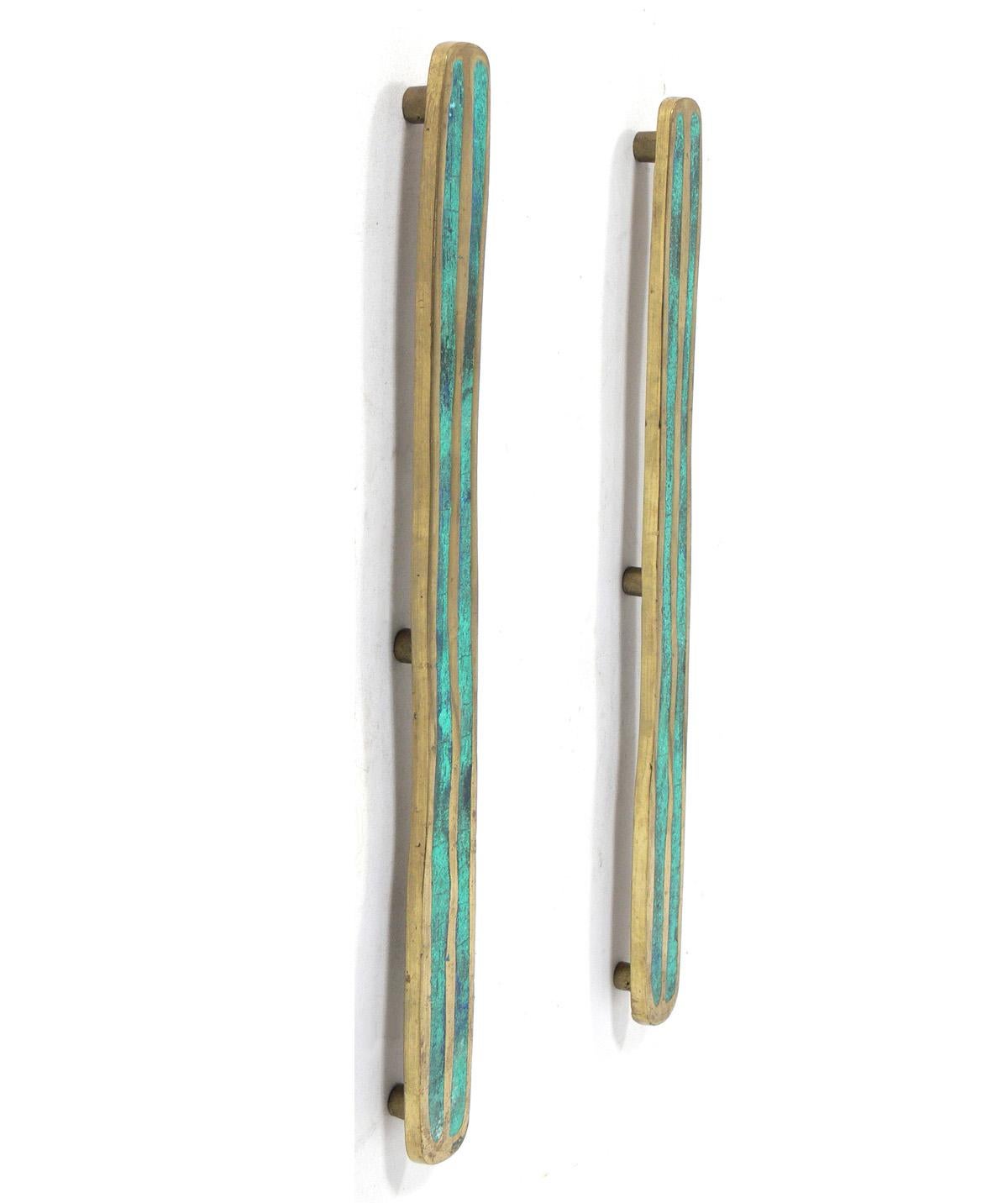 Pair of Large Scale Handles by Pepe Mendoza, Mexico, circa 1950s. These handles can be used vertically or horizontally as hardware for a special piece of furniture, or if you prefer, we can extend the depth of the attachment posts on the back so