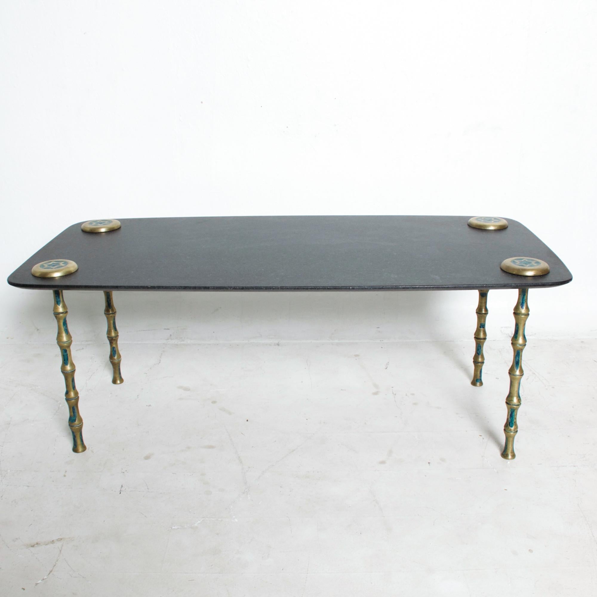 For your consideration: 1950s Pepe Mendoza large coffee table designed in Marble, Brass and Malachite Mexican Modernism at its best.
Dimensions are: 55 L x 26.5 W x 21.5 H
Original vintage preowned unrestored condition. Please refer to Images