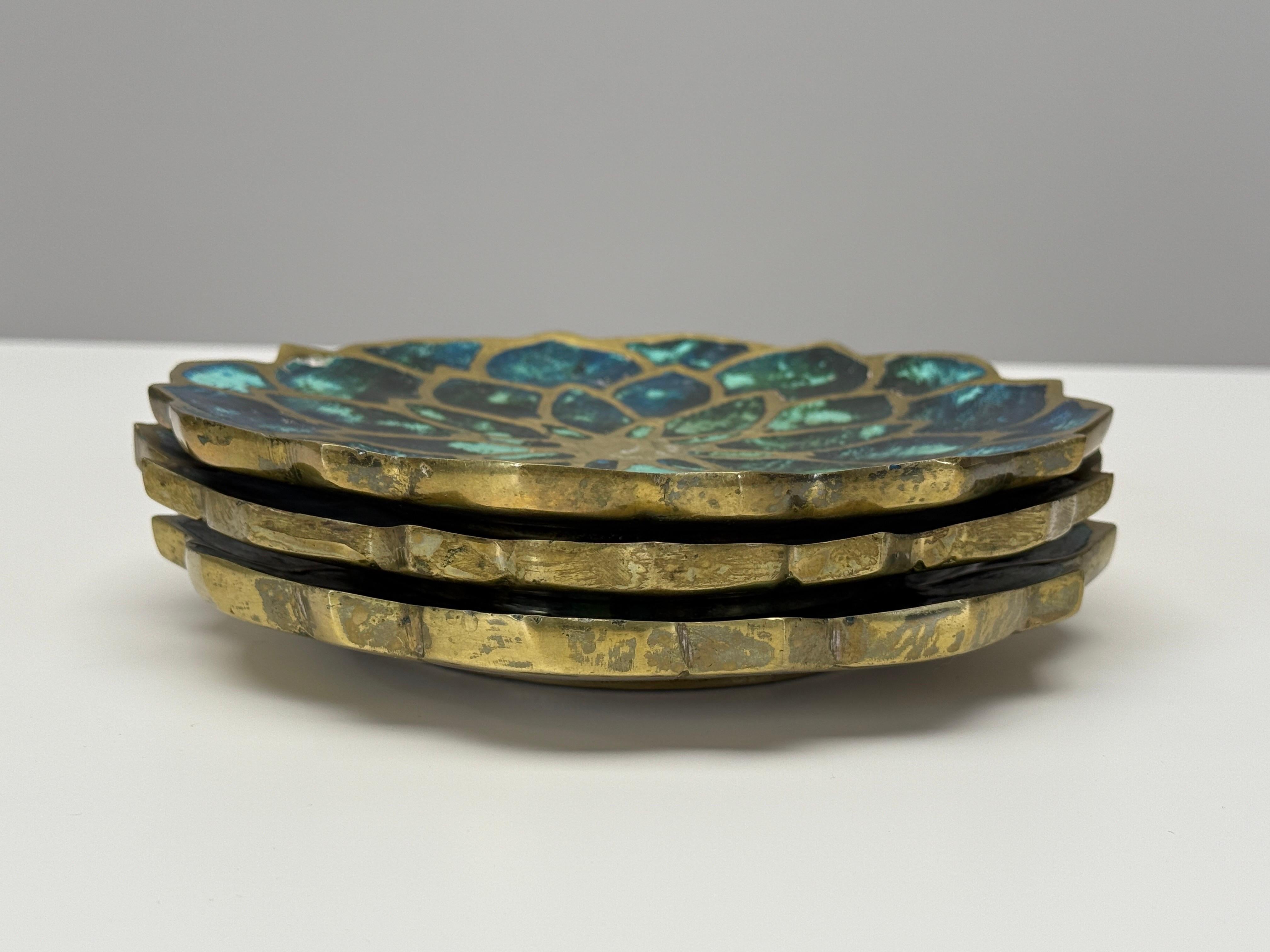 A lotus shaped tray in solid brass with faux stone inlay by Pepe Mendoza. Three available. 