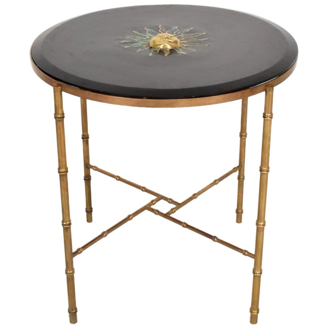 AMBIANIC presents
Pepe Mendoza Brass Malachite Smiling Sun Sculpture Table.  
A Stunning Round Center Table Patinated Solid Brass Faux Bamboo.
Mexican Modernism 1950s.
Wood Tabletop with beveled edges.
Note the tabletop and base are married pieces