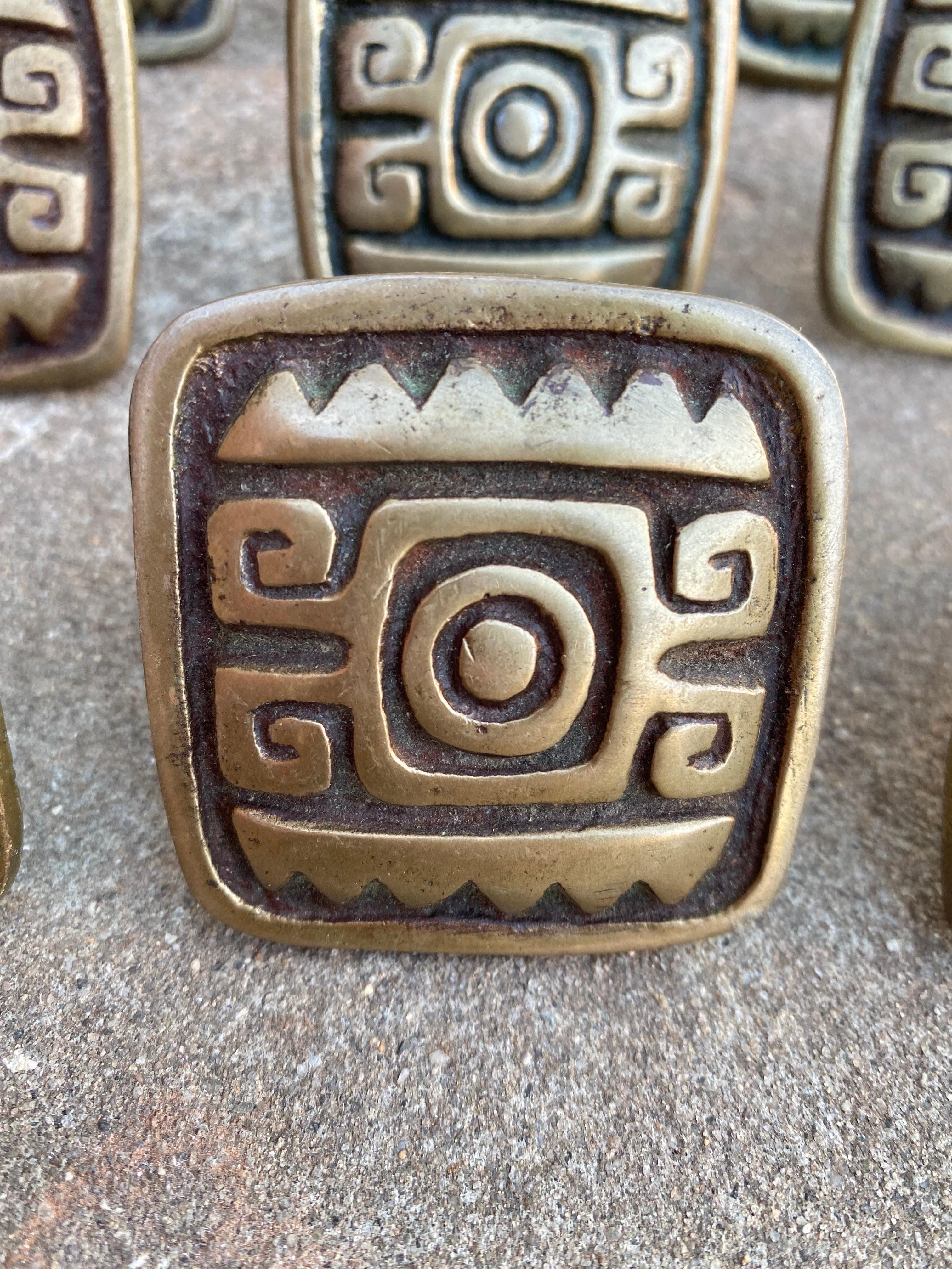 Set of 11 Mexican Inspired Brass Handles!  Nice Group, perfect to use on many different pieces of furniture or cabinets.