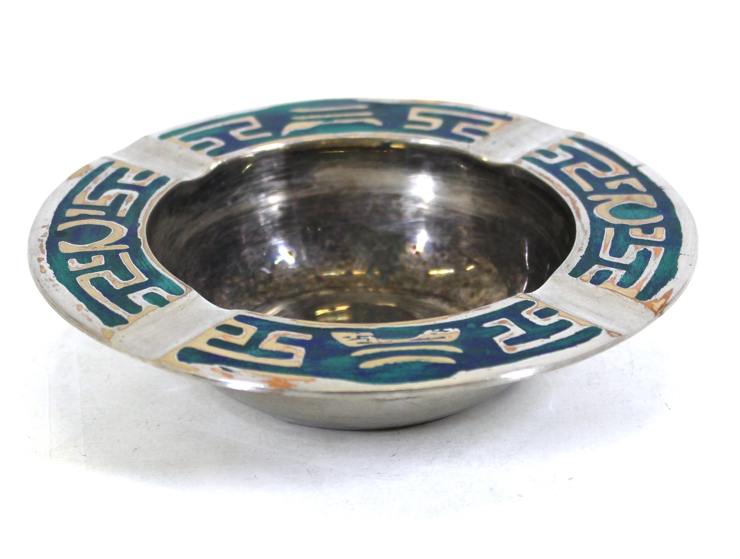 Mexican Mid-Century Modern small dish or ashtray in silver-plate with turquoise inlay elements, made by Pepe Mendoza in the 1980s. Stamped with a makers mark on the bottom. In great vintage condition with age-appropriate wear.