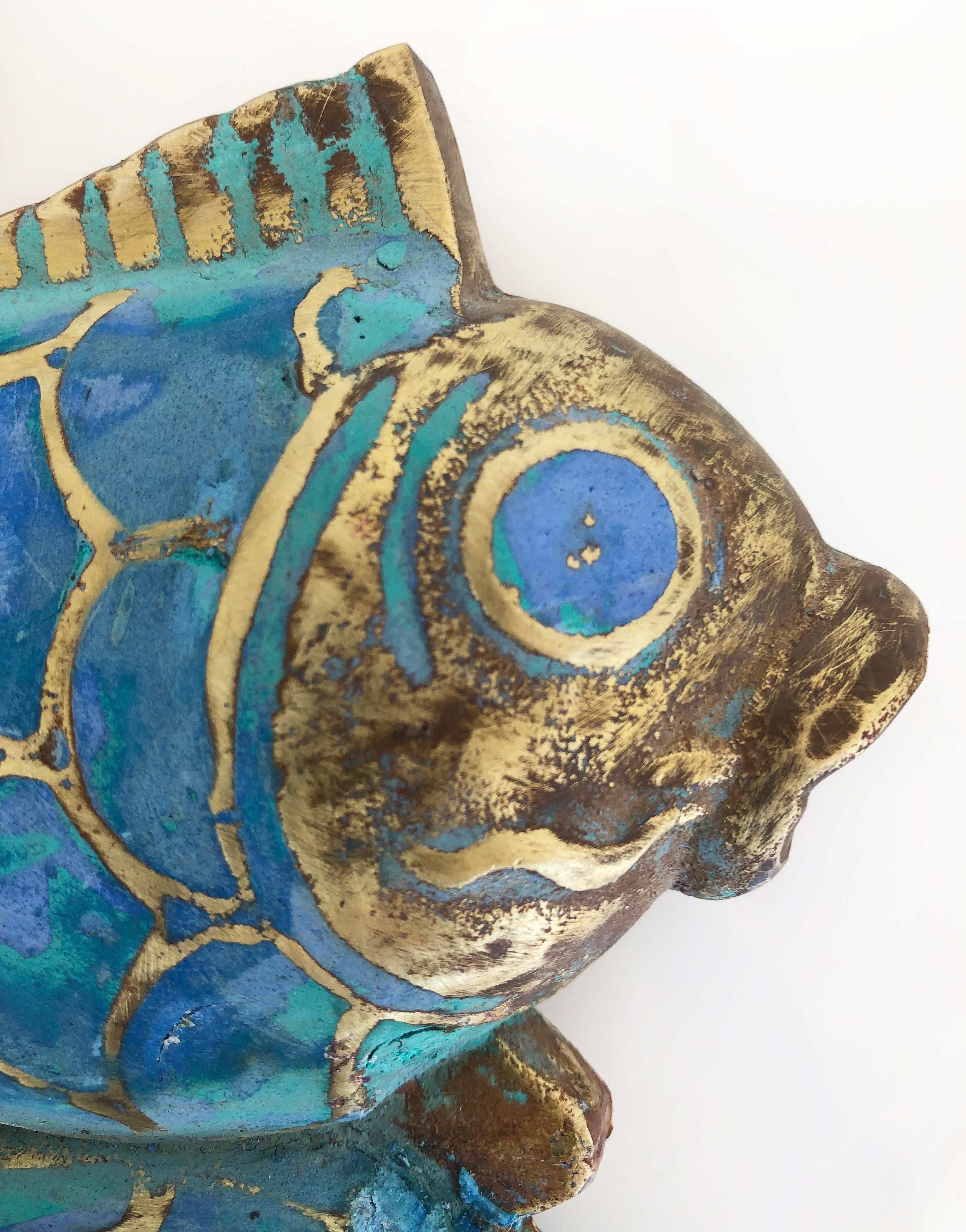 Pepe Mendoza mid-century brass turquoise fish handles, pair

Offered for sale is a large pair of Mid-Century Modern door handles by Pepe Mendoza from Mexico. The handles are turquoise and brass pairs of fish and each retains the original Pepe