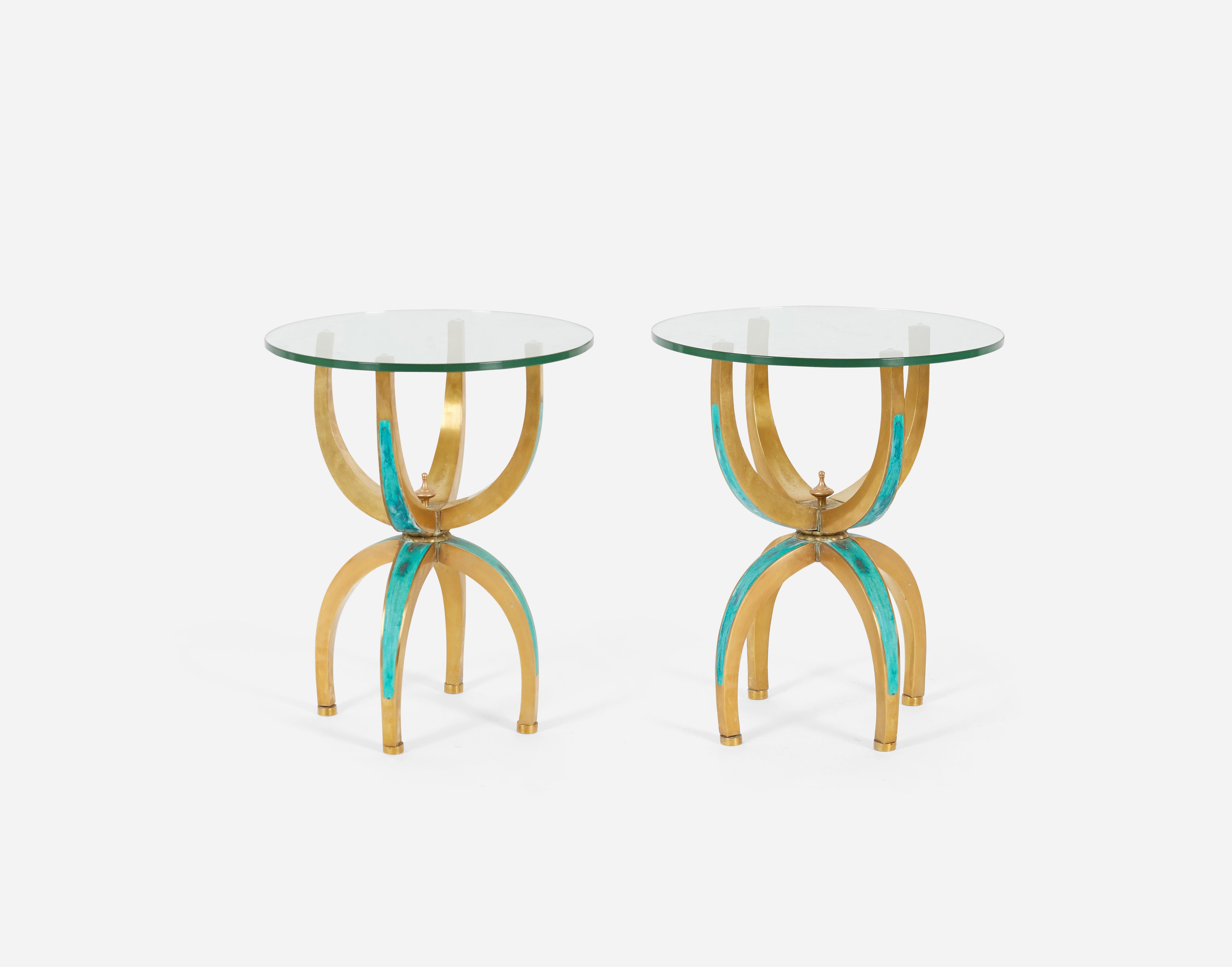 Pair of side tables by Pepe Mendoza. Brass forms with ceramic inlay. New glass tops.
