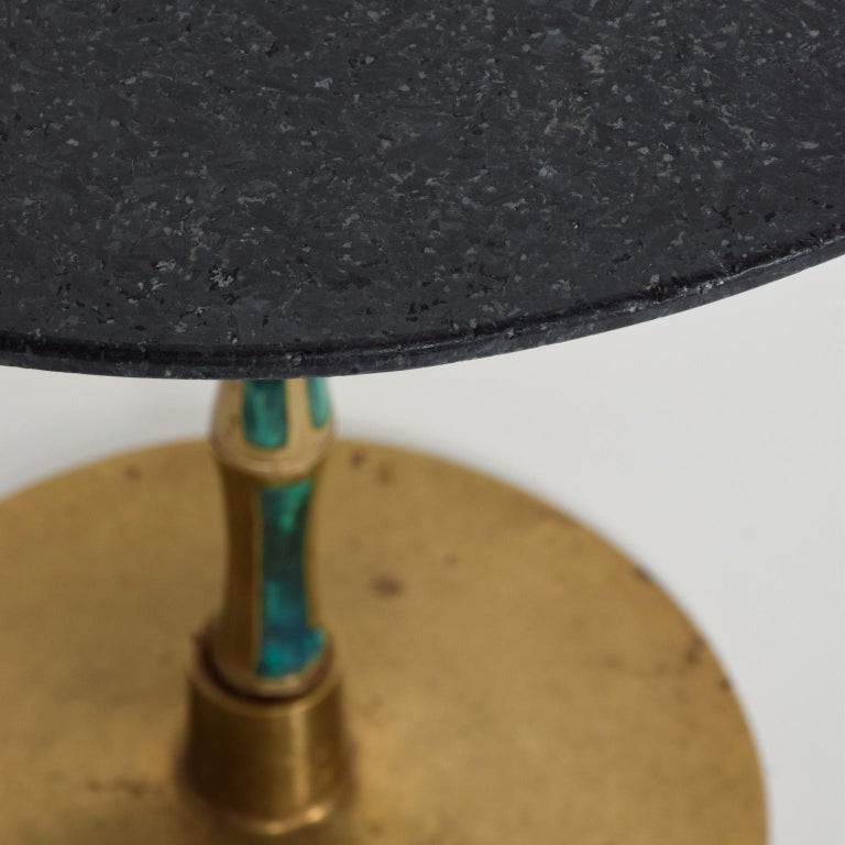 For your consideration, a pair of side tables made by Pepe Mendoza, Pedestal with a single column. Constructed with bronze, malachite and black round stone. Stamped with makers foundry mark. Made in Mexico circa late 1950s. Although both tables look