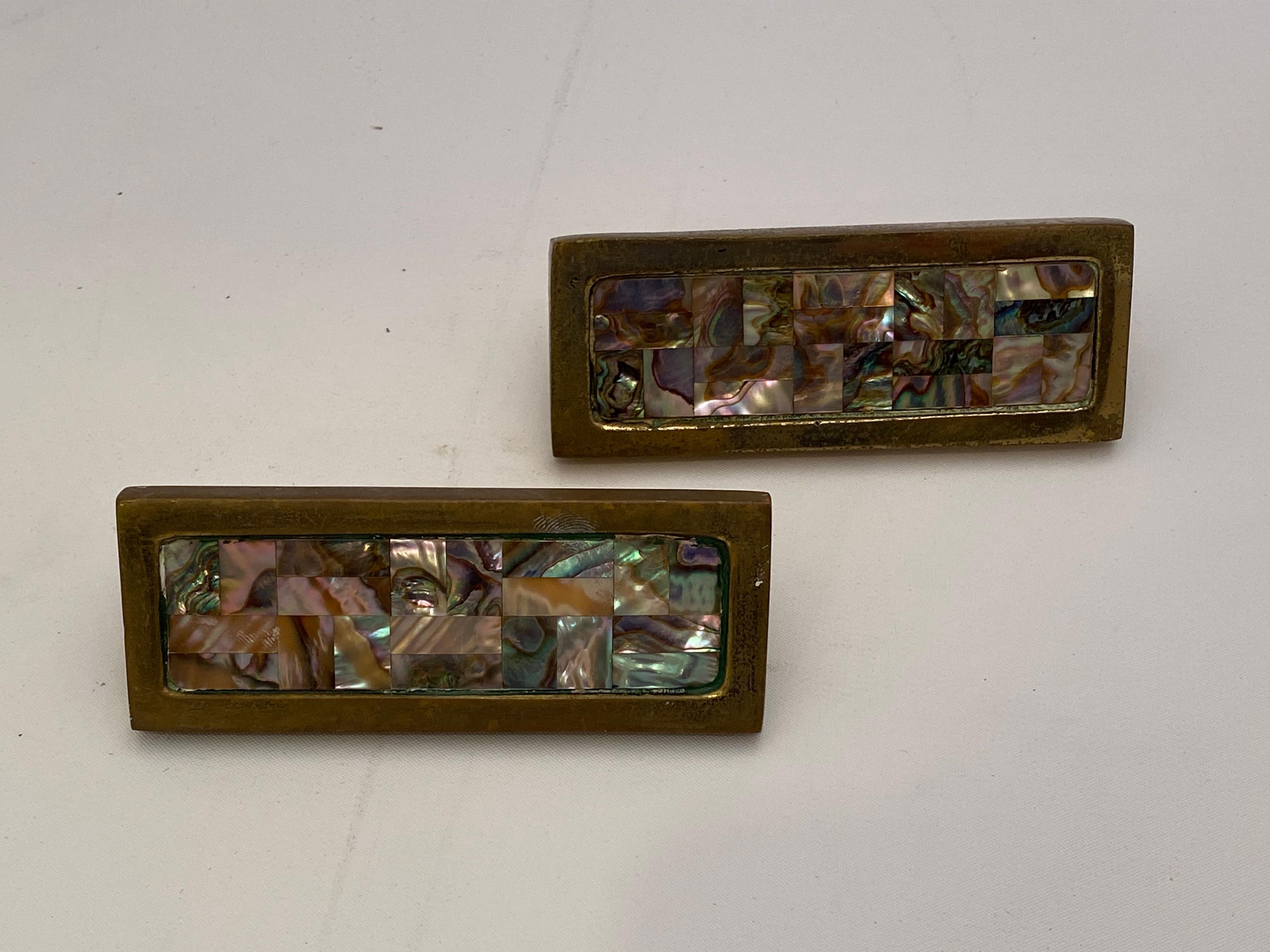 Pepe Mendoza style solid brass and inlaid abalone shell rectangular hardware pulls. Period 1960s hardware great for furniture or door hardware. Stamped on reverse, Japan. Good overall condition with some tarnish, wear and scratches from