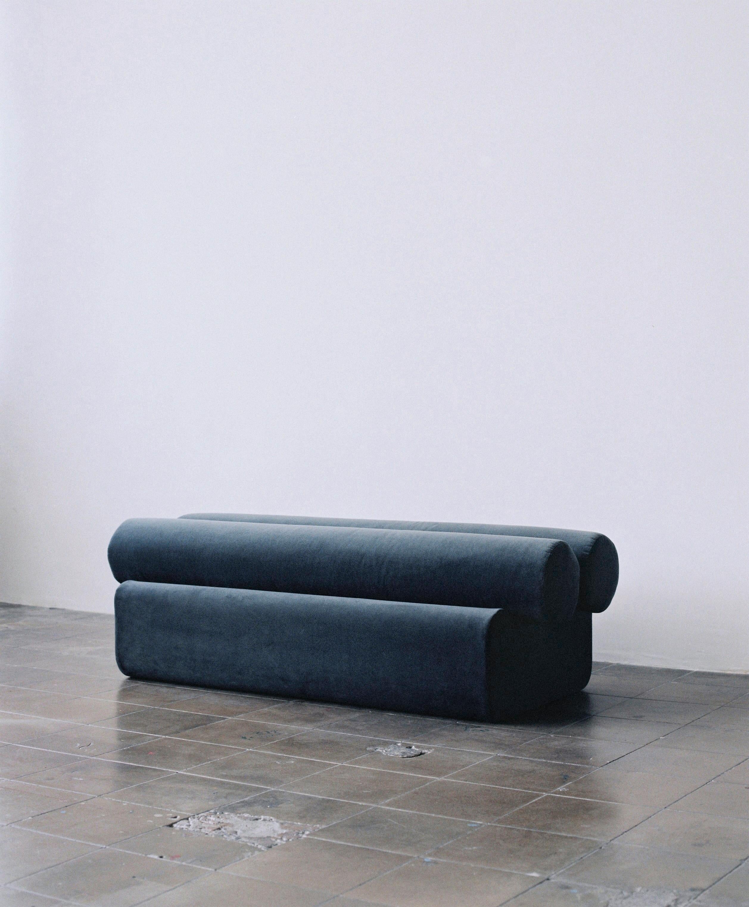Pepino bench by Owl
Dimensions: L 140 x W 60 x H 46 cm
Materials: Plywood base, upholstered

La Pepino is a collection of only seating, which consists of the repetition of cylindrical cushions, supported by an organically shaped base. Every