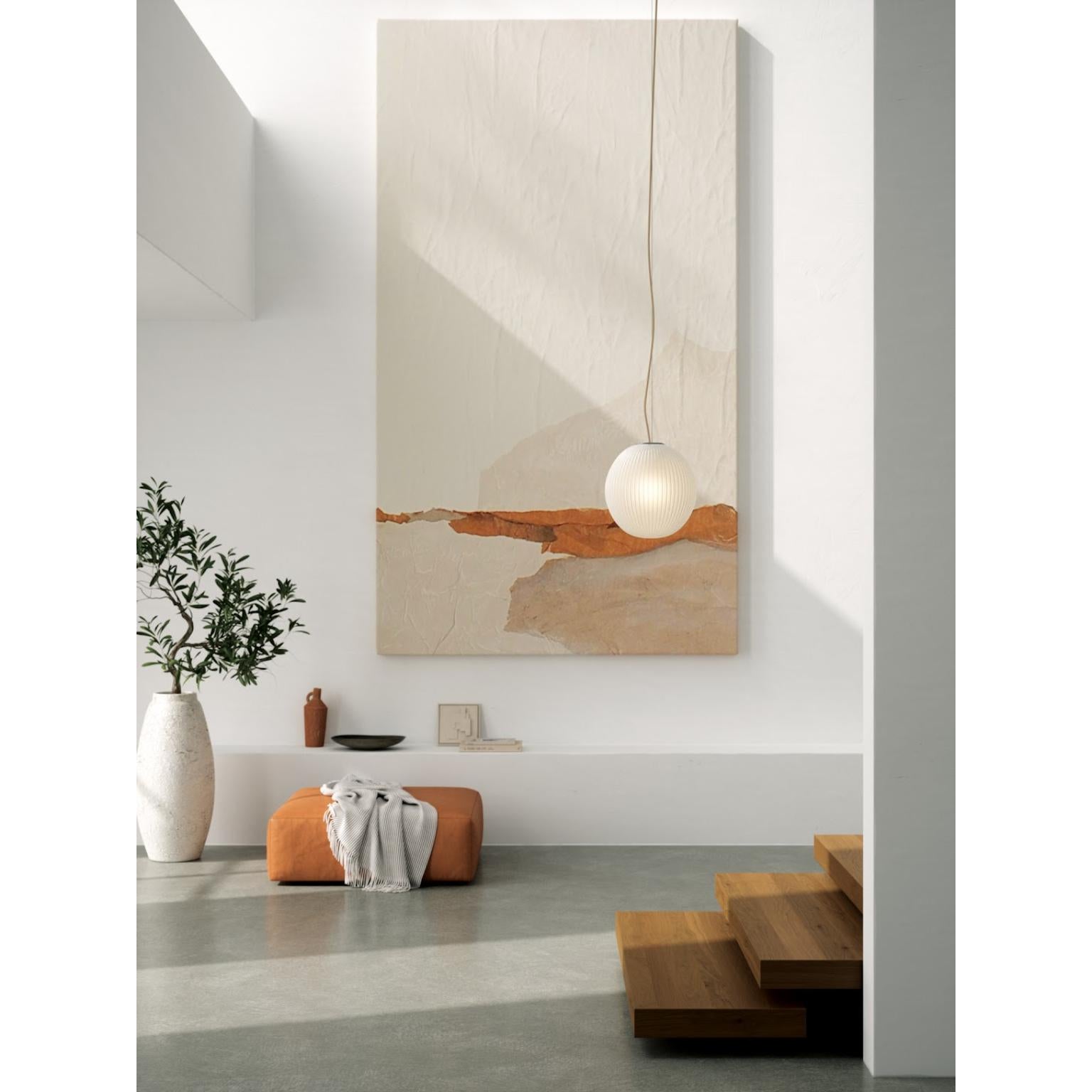 Pepo Pendant Lamp by Nordic Tales
Designed by Jonas Hoejgaard
Dimensions: Ø 25 x H 26 cm.
Materials: Glass and aluminum.
Finish: Black textile cord.

All our lamps can be wired according to each country. If sold to the USA it will be wired for the