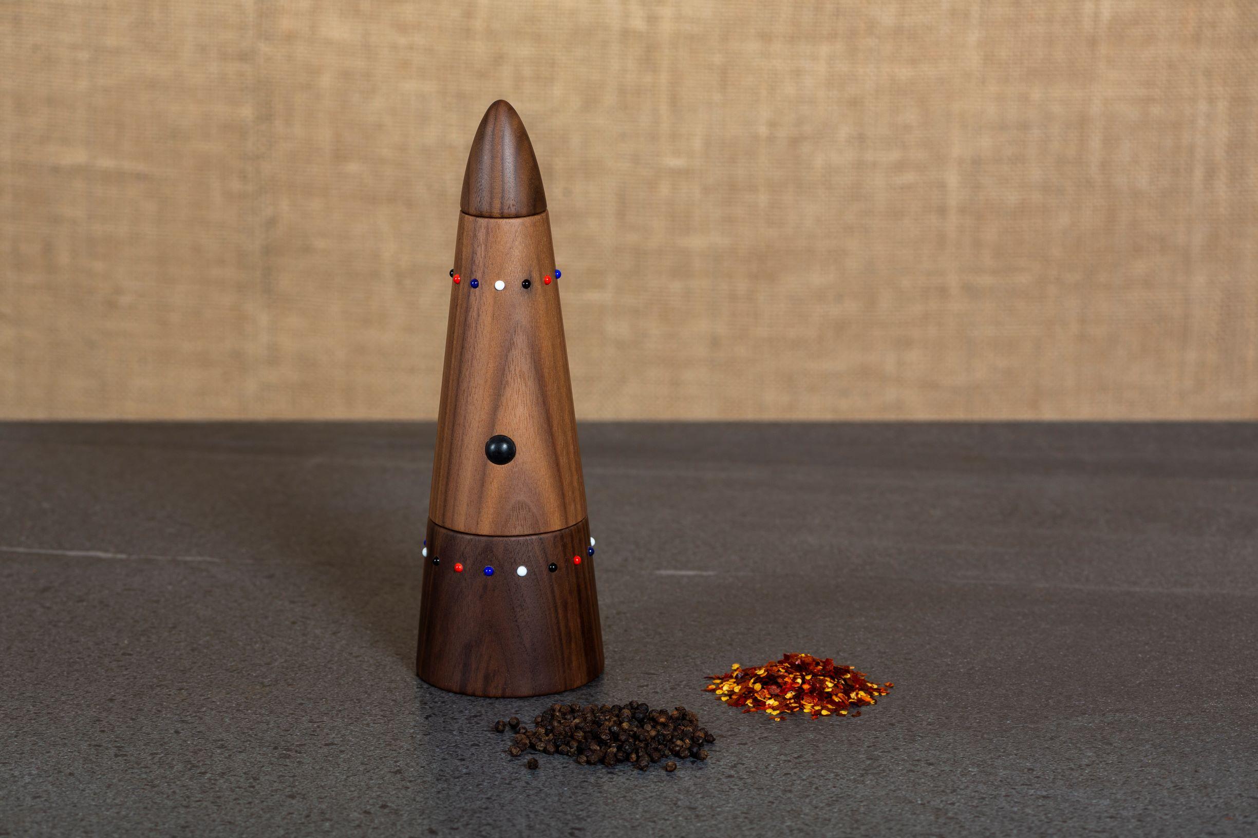 The SoShiro Pok collection pepper grinder is crafted from walnut wood, embedded with glass pearl beads, and fitted with all-ceramic, non-oxidizing or corroding grinding mechanisms offering 14 granular size settings. 

The Pok collection celebrates
