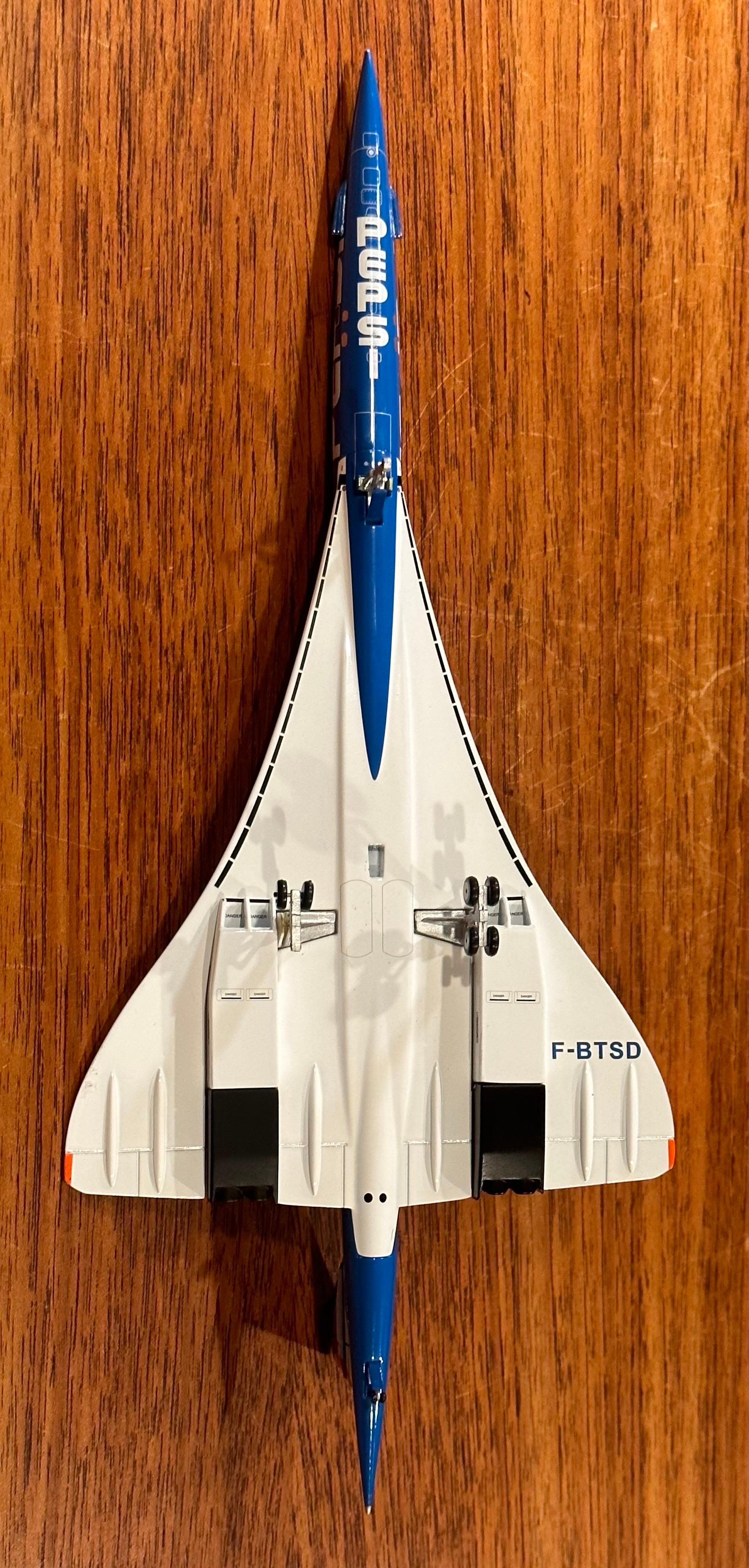 Metal Pepsi Logoed Concorde Jetliner Desk Model on Lucite Base For Sale