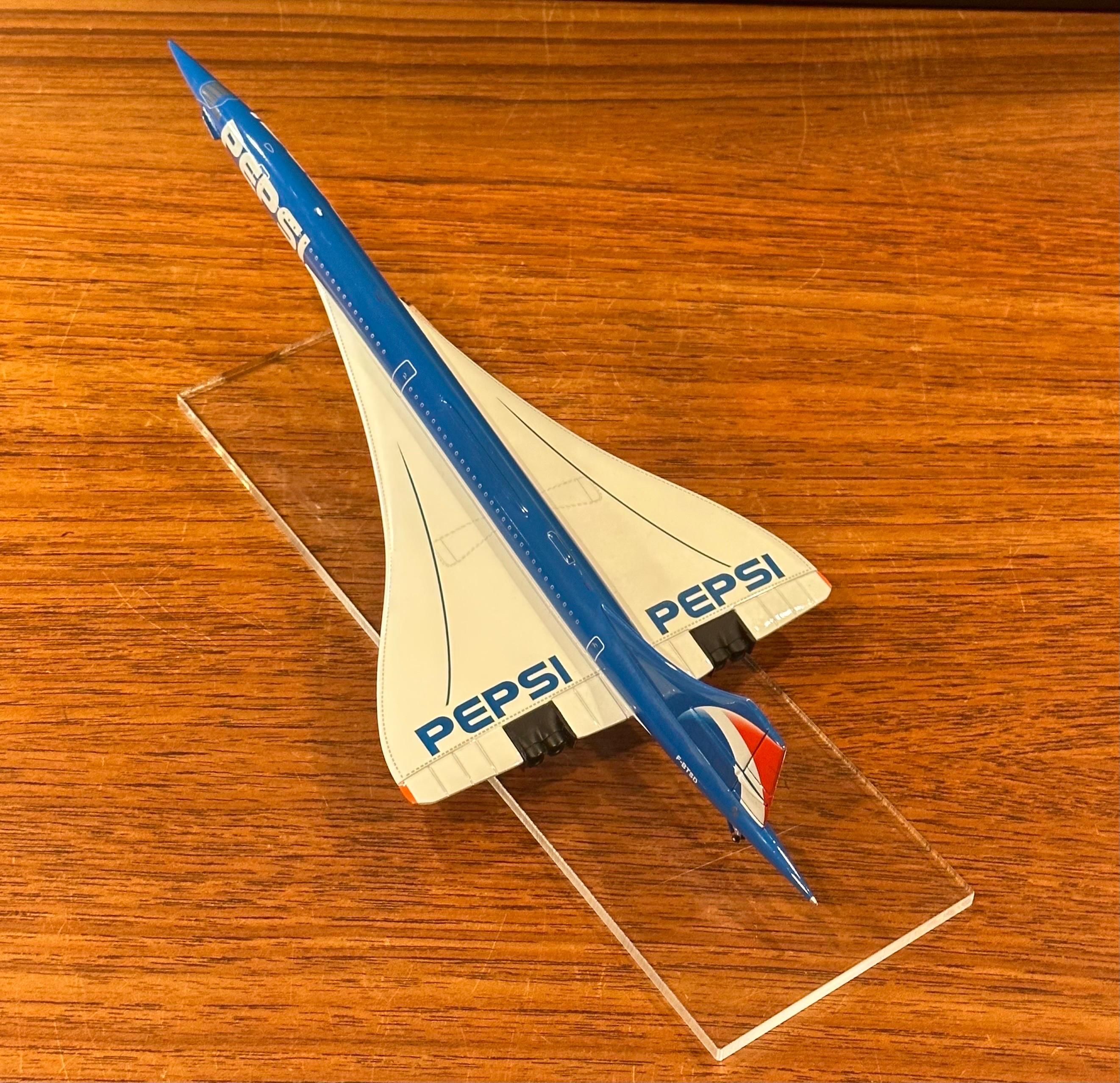 Japanese Pepsi Logoed Concorde Jetliner Desk Model on Lucite Base For Sale