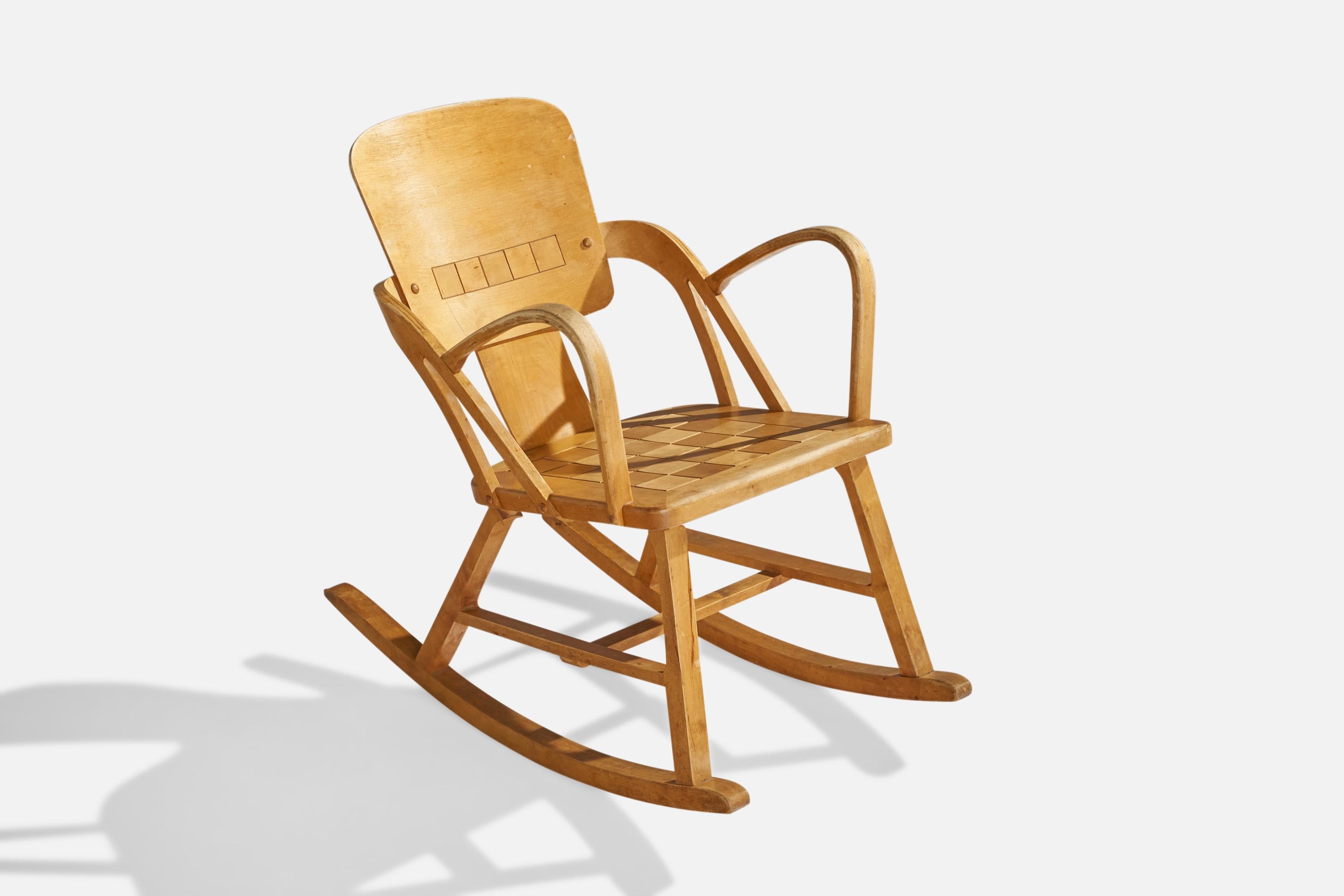 Ein Schaukelstuhl aus Birke, entworfen von Per Aaslid und hergestellt von Aaslid Møbelfabrikk, Fyrde, Volda, Norwegen, um 1950.

Sitzhöhe: 16.5