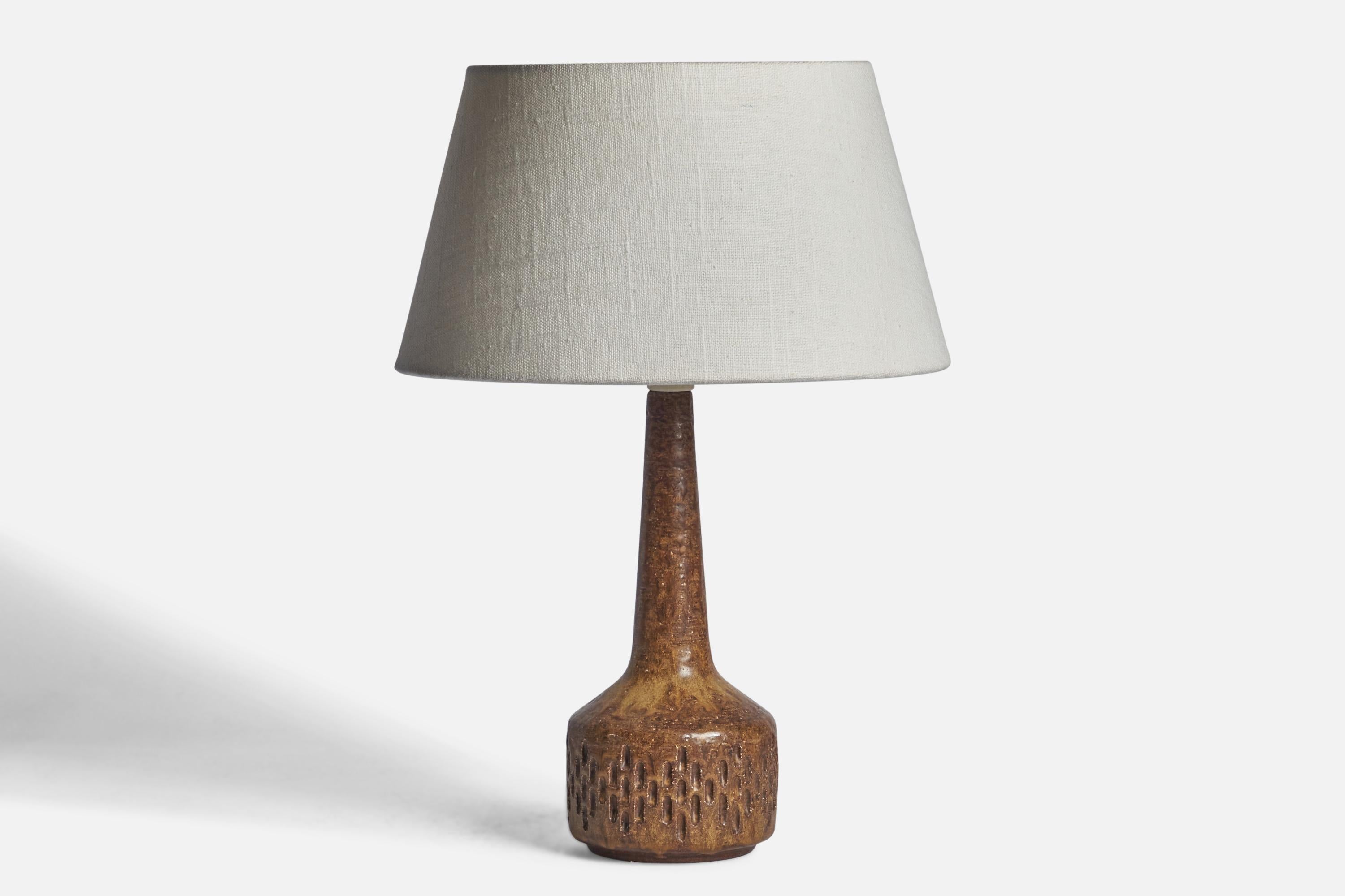 A brown-glazed stoneware table lamp designed by Per & Annelise Linneman-Schmidt and produced by Palshus, Denmark, 1960s

Dimensions of Lamp (inches): 11” H x 3.85” Diameter
Dimensions of Shade (inches): 7” Top Diameter x 10” Bottom Diameter x