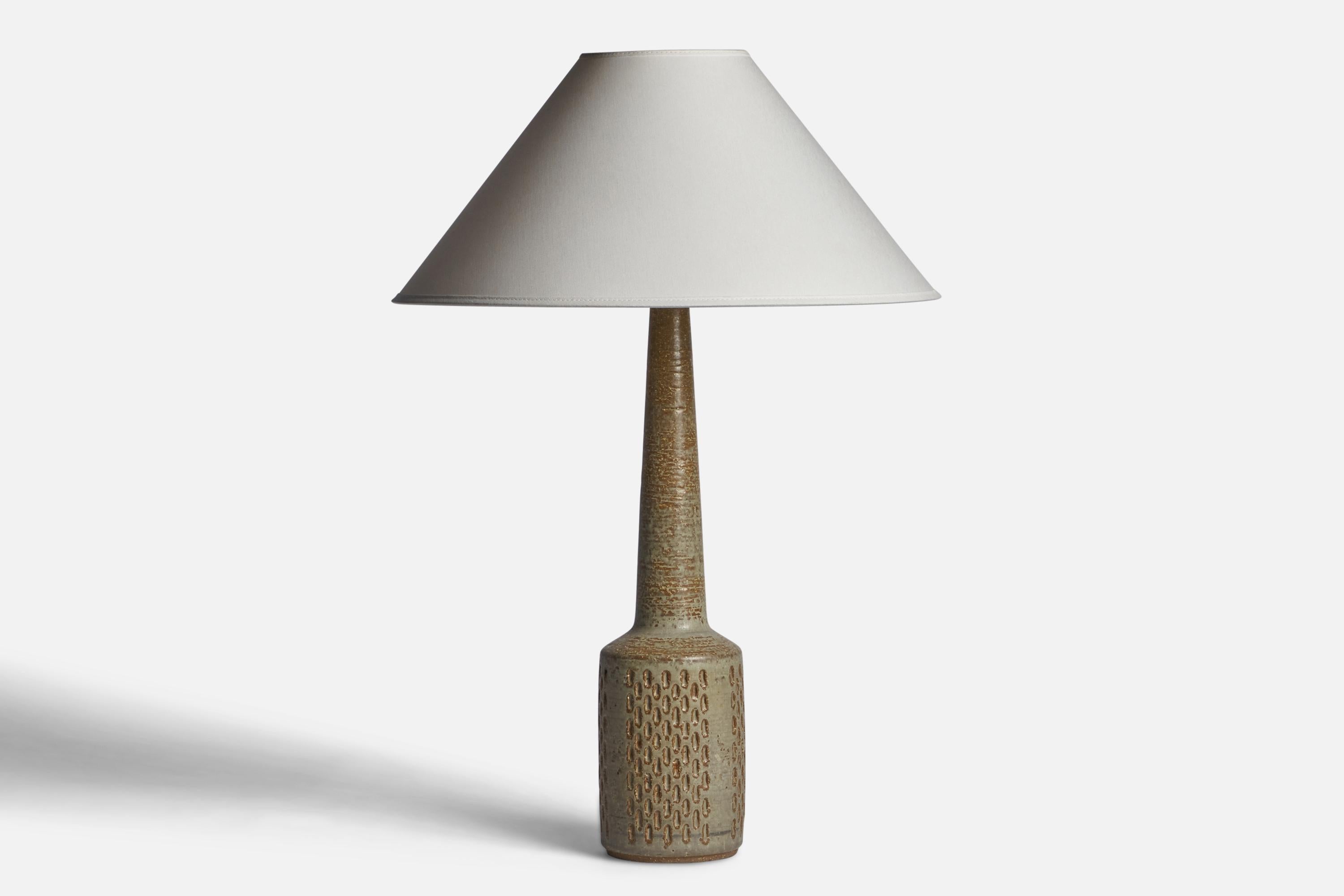 A grey-glazed stoneware table lamp designed by Per & Annelise Linneman-Schmidt and produced by Palshus, Denmark, 1960s.

Dimensions of Lamp (inches): 19.15” H x 4.15” Diameter
Dimensions of Shade (inches): 4.5” Top Diameter x 16” Bottom Diameter x