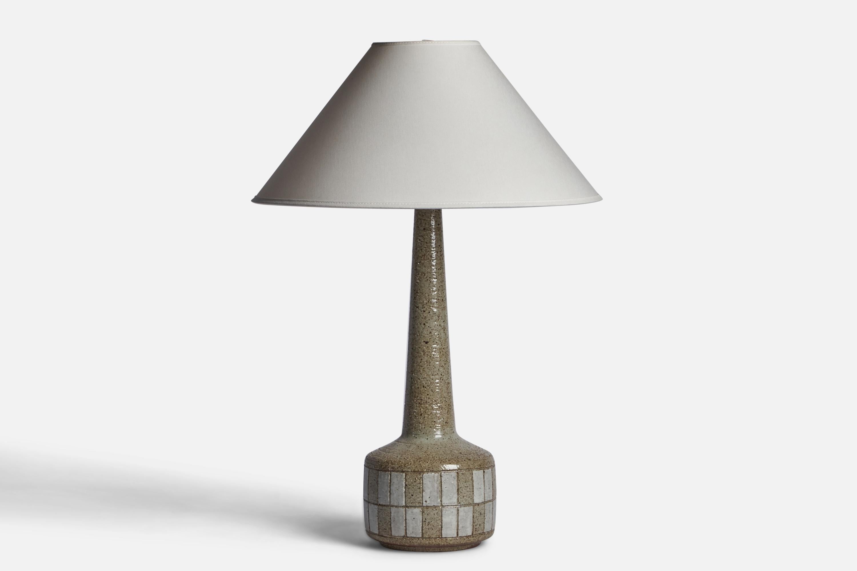 A light grey-glazed stoneware table lamp designed by Per & Annelise Linneman-Schmidt and produced by Palshus, Denmark, 1960s

Dimensions of Lamp (inches): 18.65” H x 6” Diameter
Dimensions of Shade (inches): 4.5” Top Diameter x 16” Bottom Diameter x
