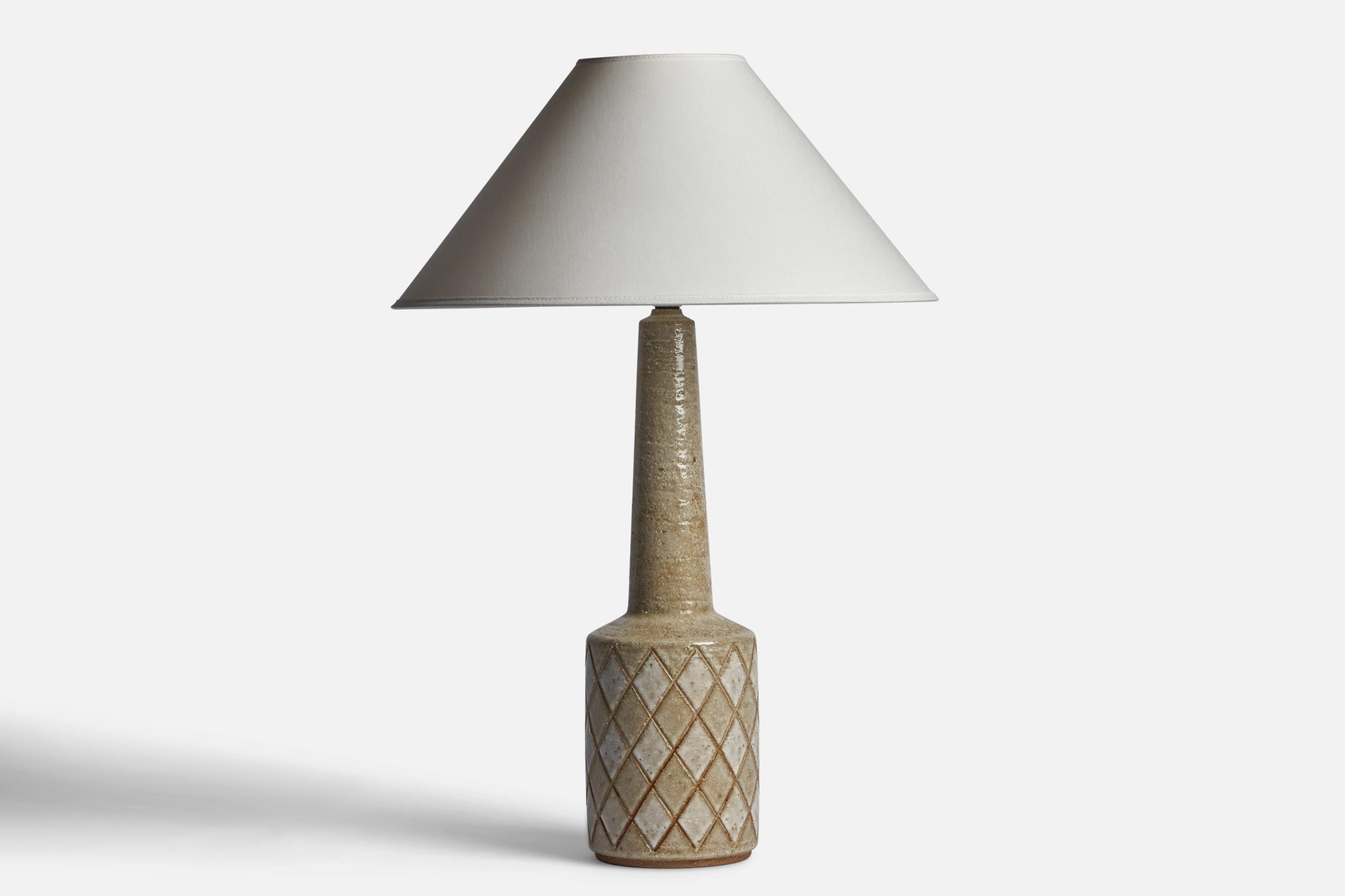 A light grey-glazed stoneware table lamp designed by Per & Annelise Linneman-Schmidt and produced by Palshus, Denmark, 1960s.

Dimensions of Lamp (inches): 19.2” H x 5.1” Diameter
Dimensions of Shade (inches): 4.5” Top Diameter x 16” Bottom Diameter