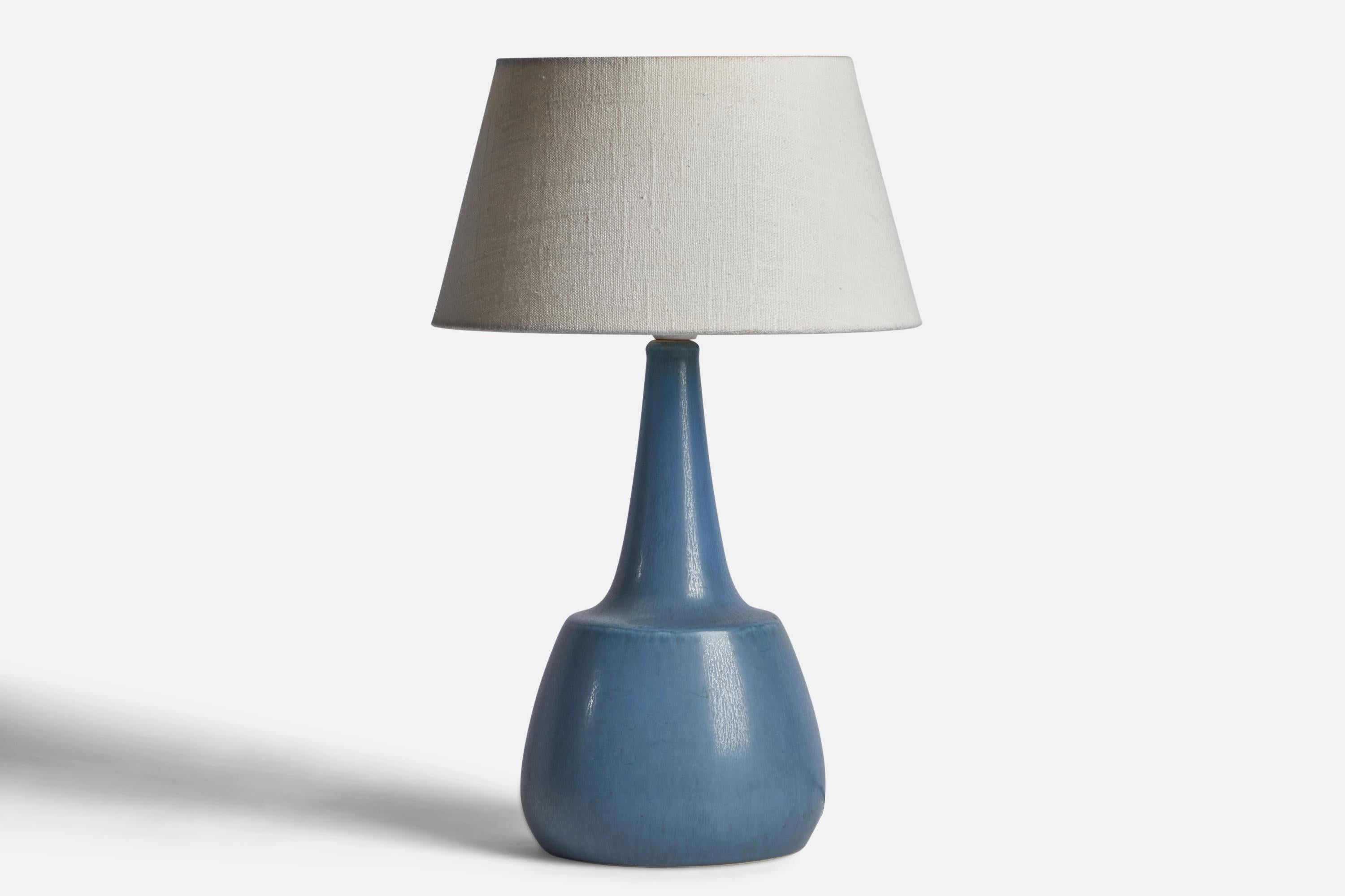 A blue-glazed stoneware table lamp designed by Per & Annelise Linneman-Schmidt and produced by Palshus, Denmark, 1960s.

Dimensions of Lamp (inches): 13.15” H x 6.3” Diameter
Dimensions of Shade (inches): 7” Top Diameter x 10” Bottom Diameter x 5.5”