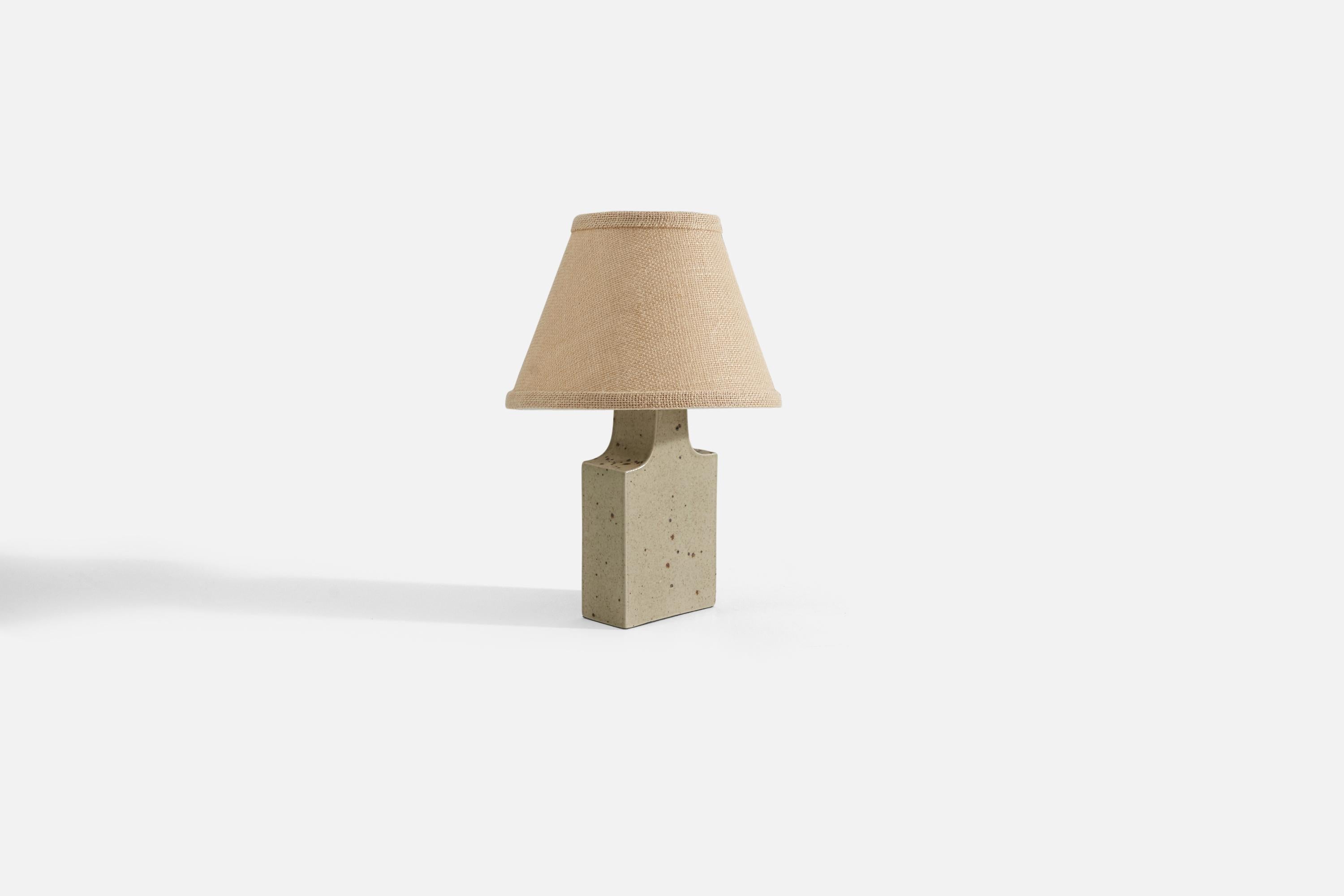 A grey-glazed, hand-cast stoneware table lamp designed by husband and wife Per & Annelise Linneman-Schmidt, and produced in their own Studio, named Palshus, in Sengeløse, Denmark. Signed.

Sold without lampshade. Stated dimensions exclude