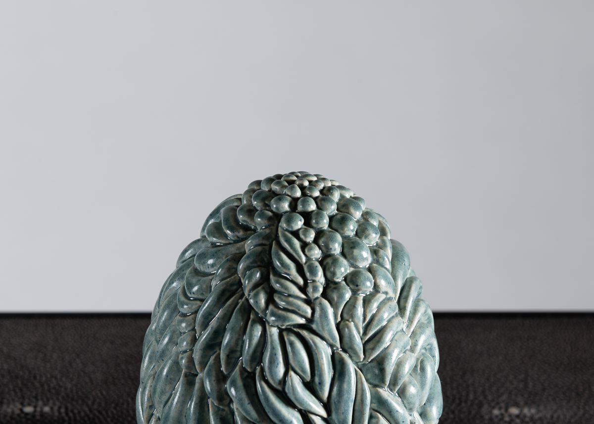 The ceramics of Swedish ceramist Per Liljegren possess an elegant symmetry of form and exteriors of mesmerizing detail.