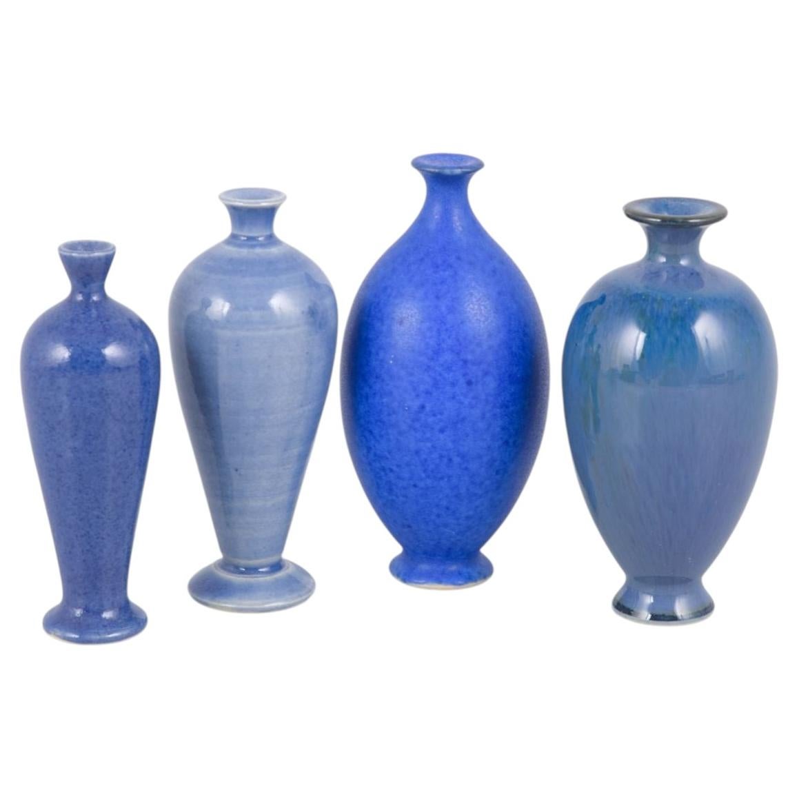 Per Liljegren. Set of four miniature stoneware vases. 1980s/90s