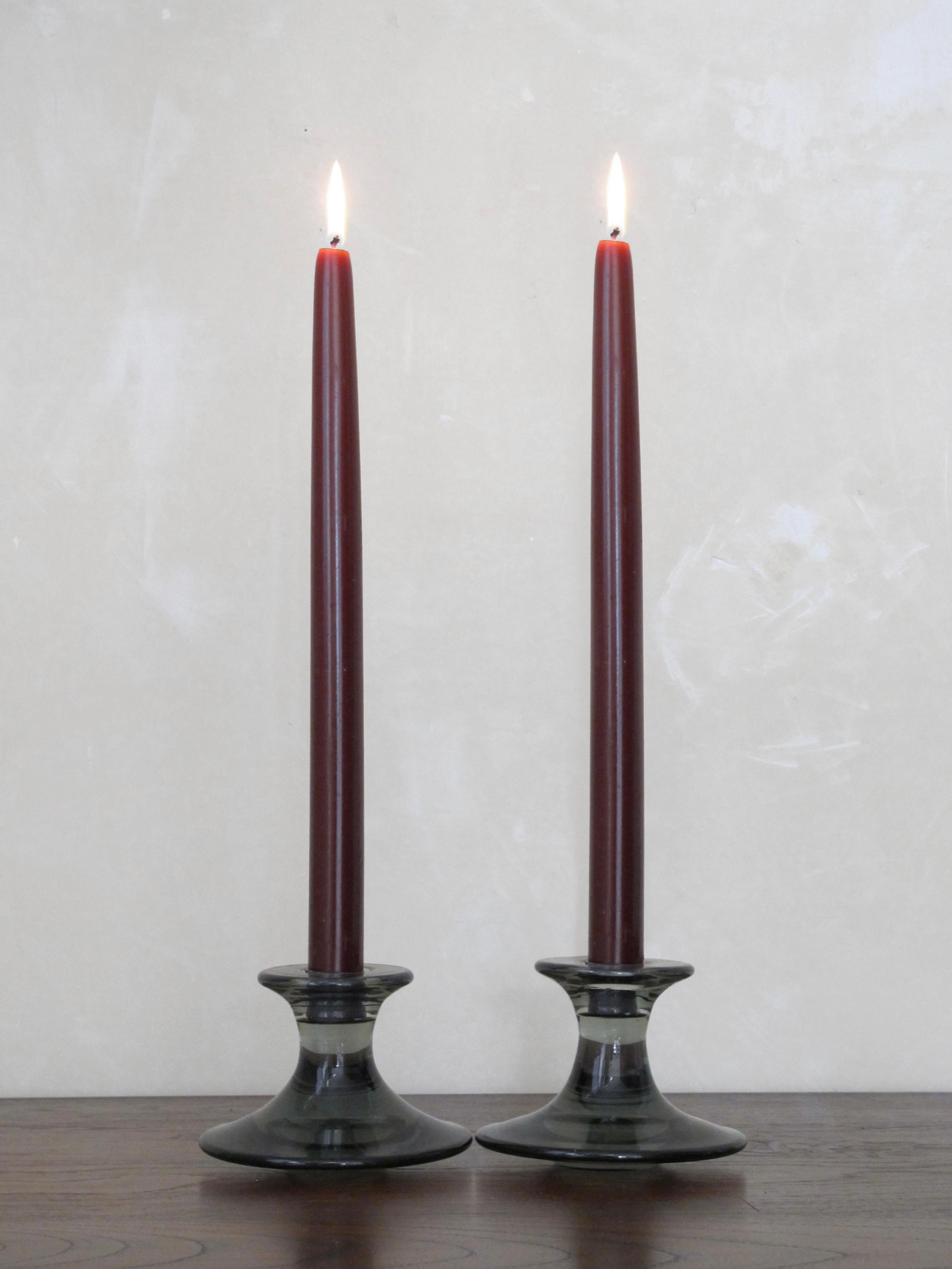 Pair of scandinavian Mid-Century Modern glass candleholder candlestick holder designed by Per Lutken and production by Holmegaard, Denmark circa 1960s.
Holmegaard signature engraved under the base.