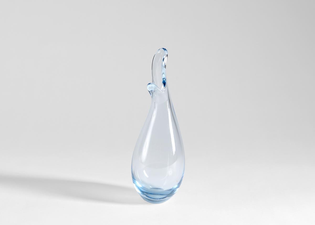 The beautiful form of Beak seems to capture a drop of water mid-splash. Signed.
