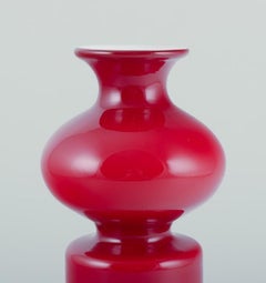 Per Lütken for Holmegaard. Carnaby vase in red and white opal glass.