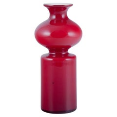 Vintage Per Lütken for Holmegaard. Carnaby vase in red and white opal glass.