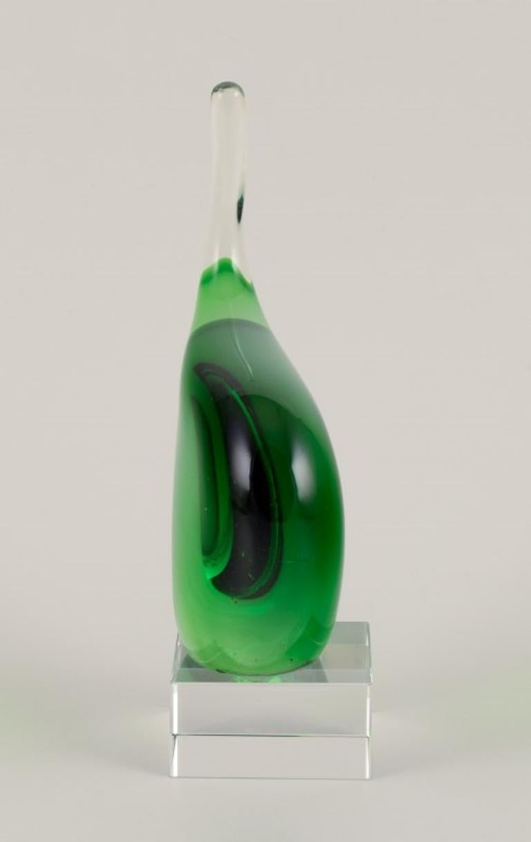 Per Lütken for Holmegaard, Denmark
Sculpture in green art glass. Organic shape.
1960s.
Perfect condition.
Dimensions: W 7.5 cm x D 3.5 cm x H 14.5 cm.