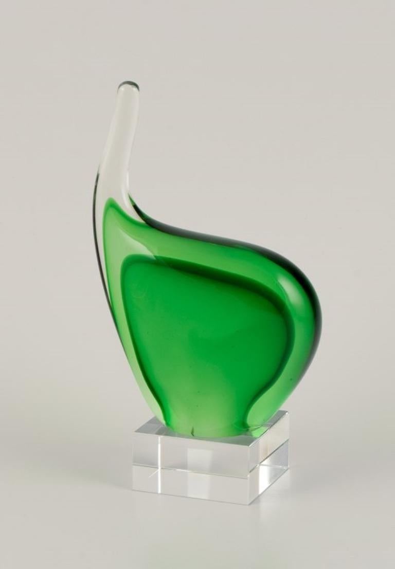 Per Lütken for Holmegaard. Sculpture in green art glass. On a base.
Organic shape.
Denmark, 1960s.
Perfect condition.
Dimensions: W 11.0 cm x D 6.0 cm x H 19.5 cm.