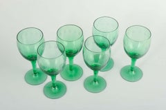Per Lütken, Holmegaard. 6 White Wine 'Kirsten Piil' Glasses in green glass.