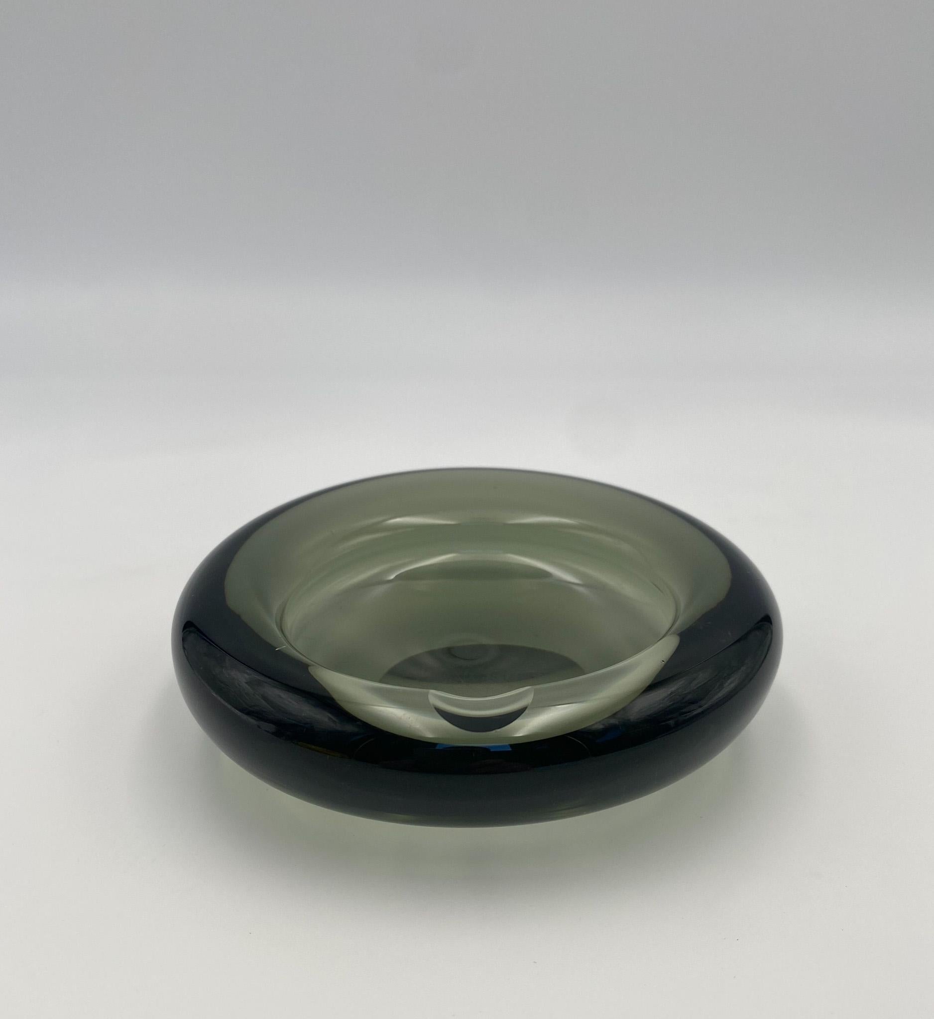 Per Lütken Modernist Smoked Glass Ashtray / Bowl for Holmegaard, Denmark, 1960's.  This piece is signed to the bottom.  