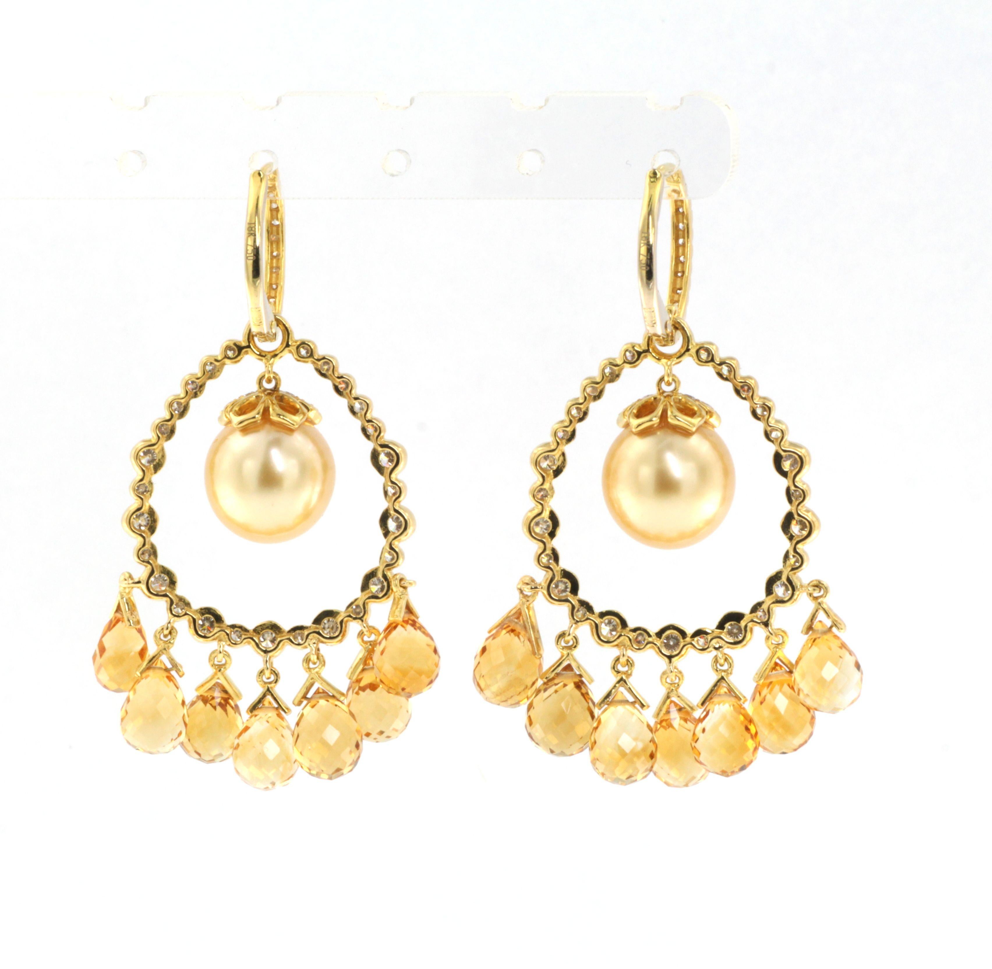 Introducing our Art Deco-inspired 18 karat yellow gold earrings, a luxurious and captivating piece of jewelry that exudes elegance and sophistication. The earrings feature a stunning 10mm goiden color south sea pearl at the center, surrounded by a