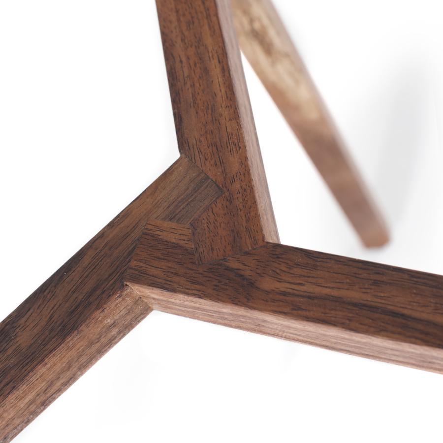 The simplicity and set of angles of the collection merge into the Coat Stand. Designed with thin lines but with great strength and stability. Produced in three different types of wood: Tzalam, walnut and oak. Every piece is handmade in Mexico City