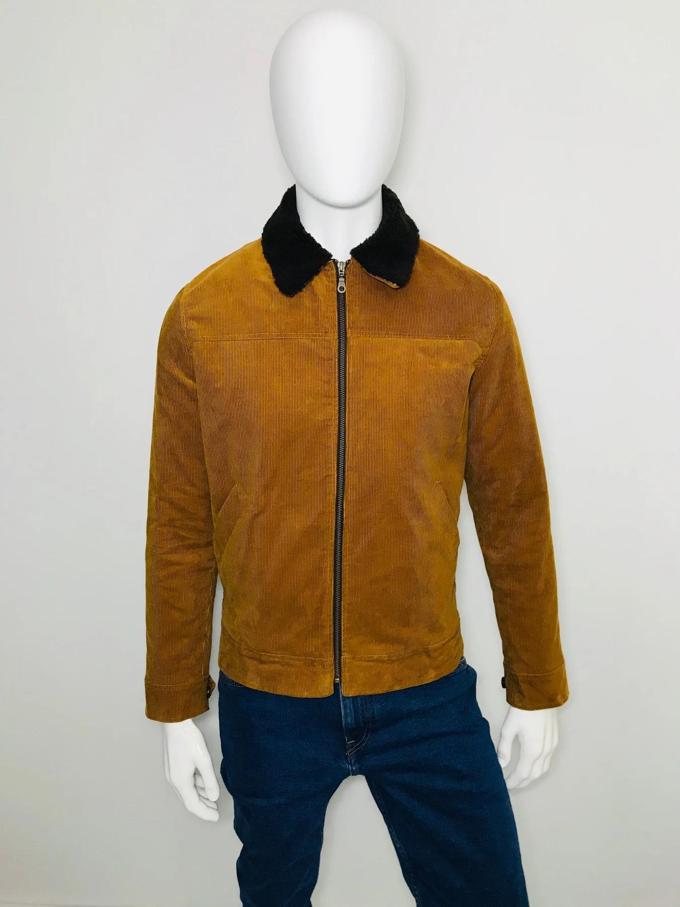 Percival Corduroy Jacket

Mustard coloured with black collar, centre zip fastening, buttoned cuffs. Long sleeves, two side slit pockets.

Size - S - 01
Condition - Very Good
Composition - Cotton 