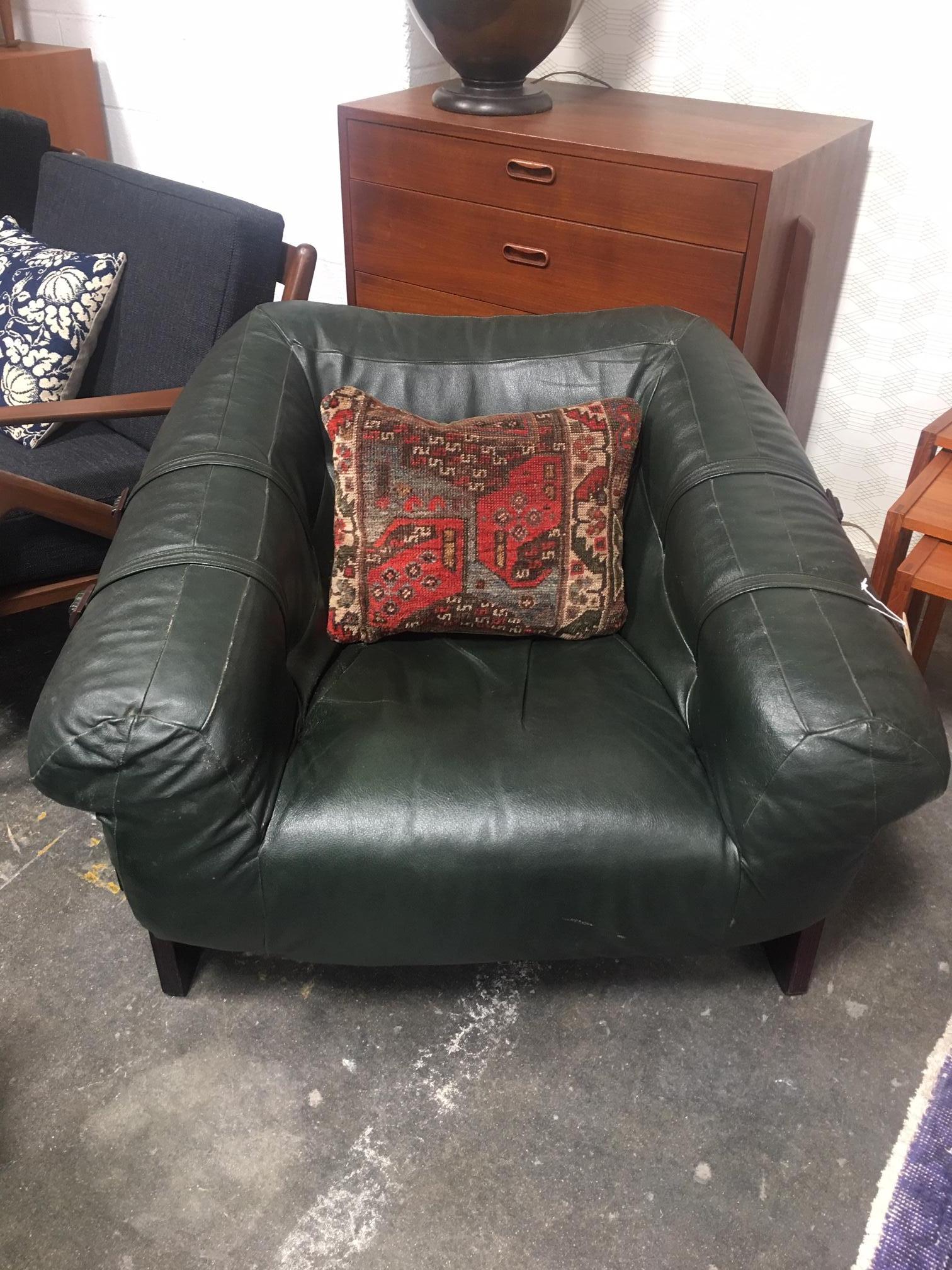 Pair of dark green leather Percival Lafer chairs. Leather is in great condition!