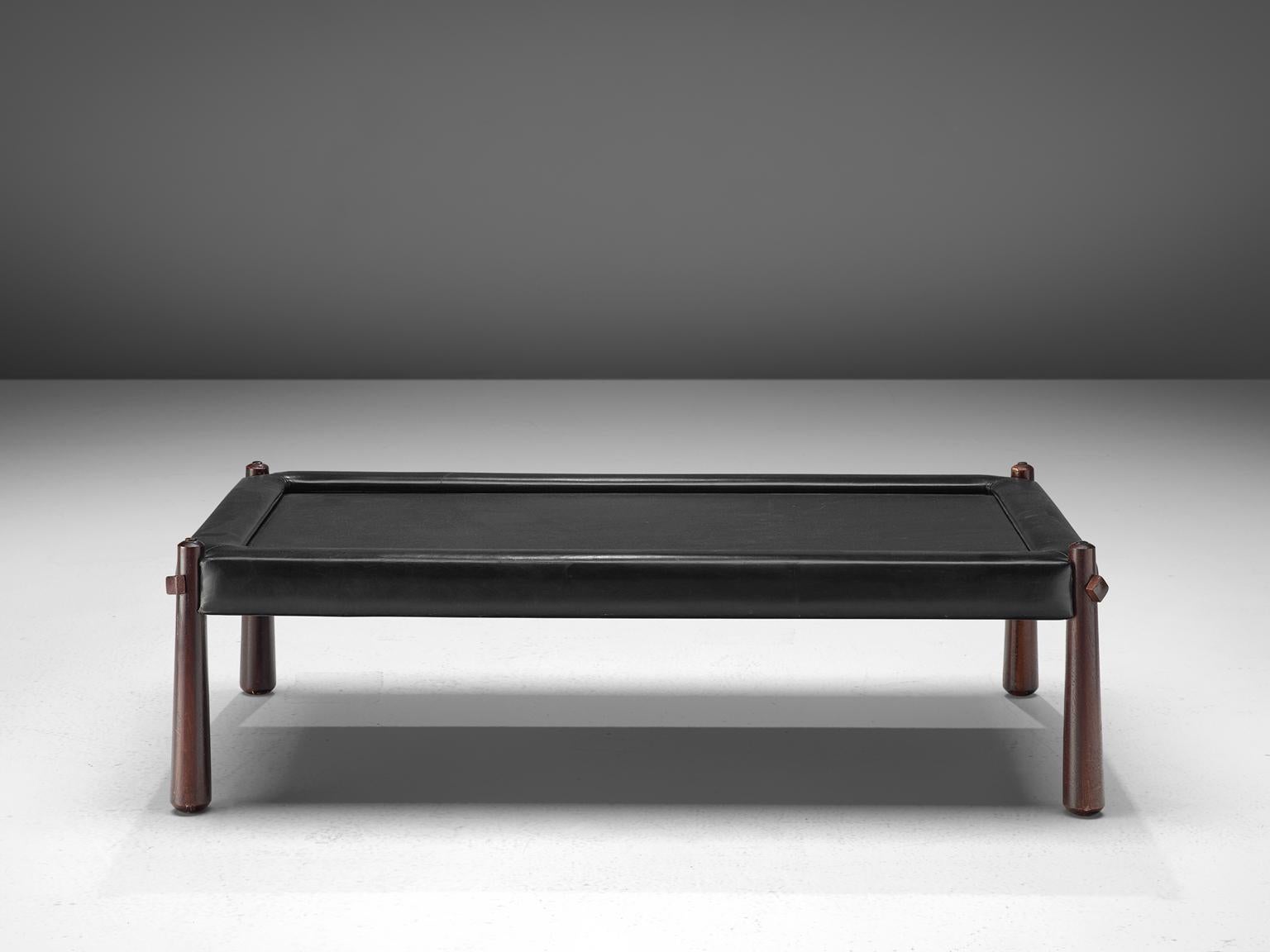 Percival Lafer, coffee table, slate, leather and rosewood, Brazil, 1970s.

This coffee table by Brazilian designer Percival Lafer features a slate chalkboard surface. The tabletop is embedded with black leather which is very notable. The rosewood