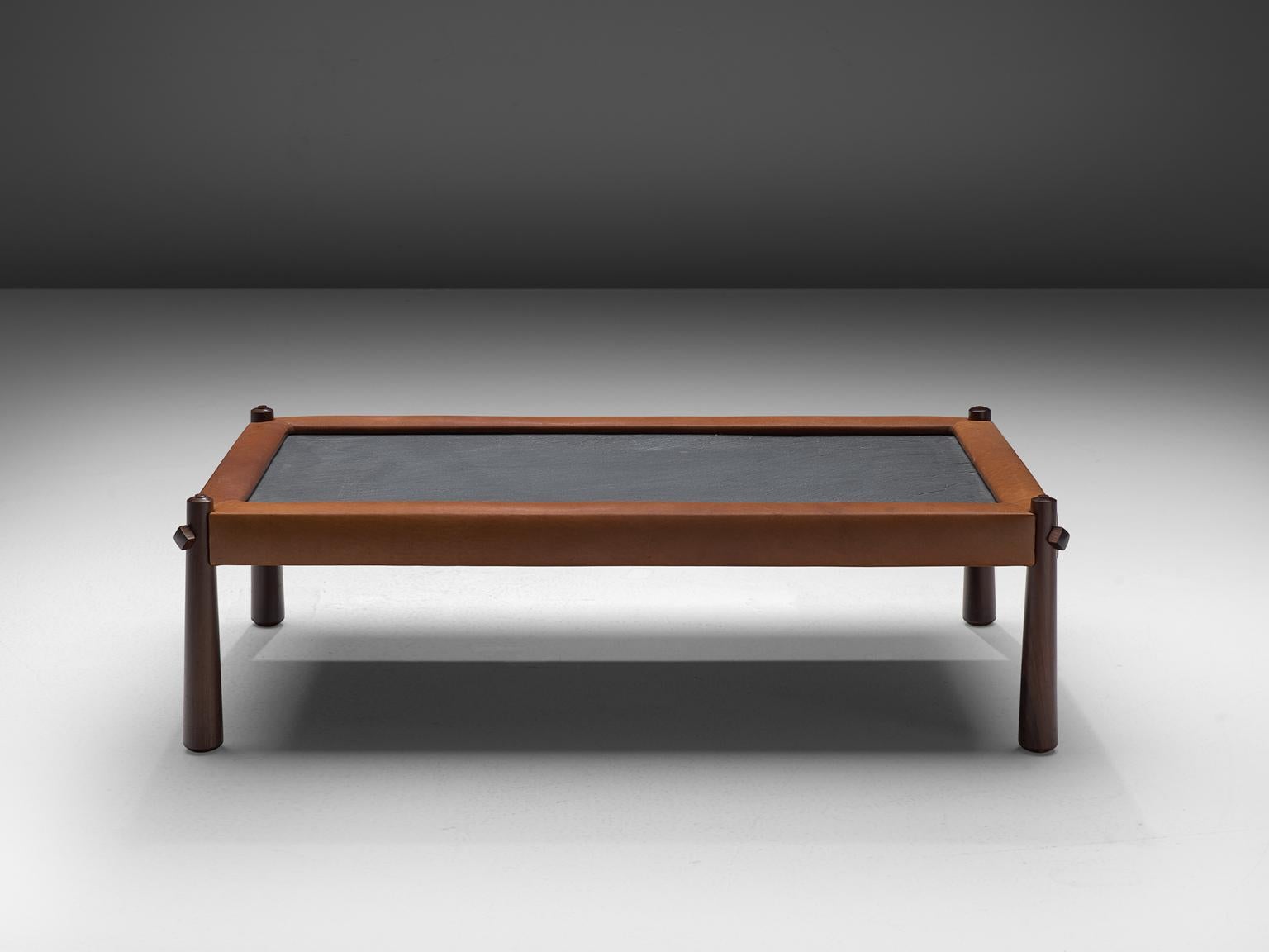 Percival Lafer, coffee table, slate, leather and rosewood, Brazil, 1970s

This coffee table by Brazilian designer Percival Lafer features a slate chalkboard surface. The tabletop is embedded with cognac leather which is very notable. The rosewood