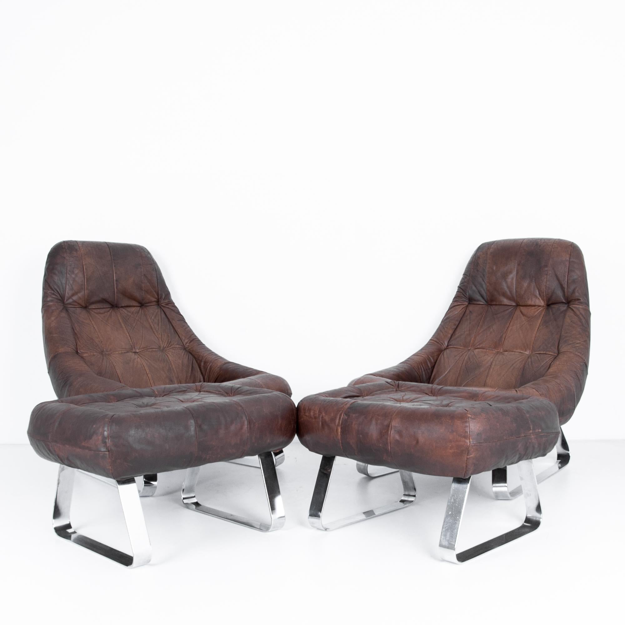 dark brown leather chair with ottoman